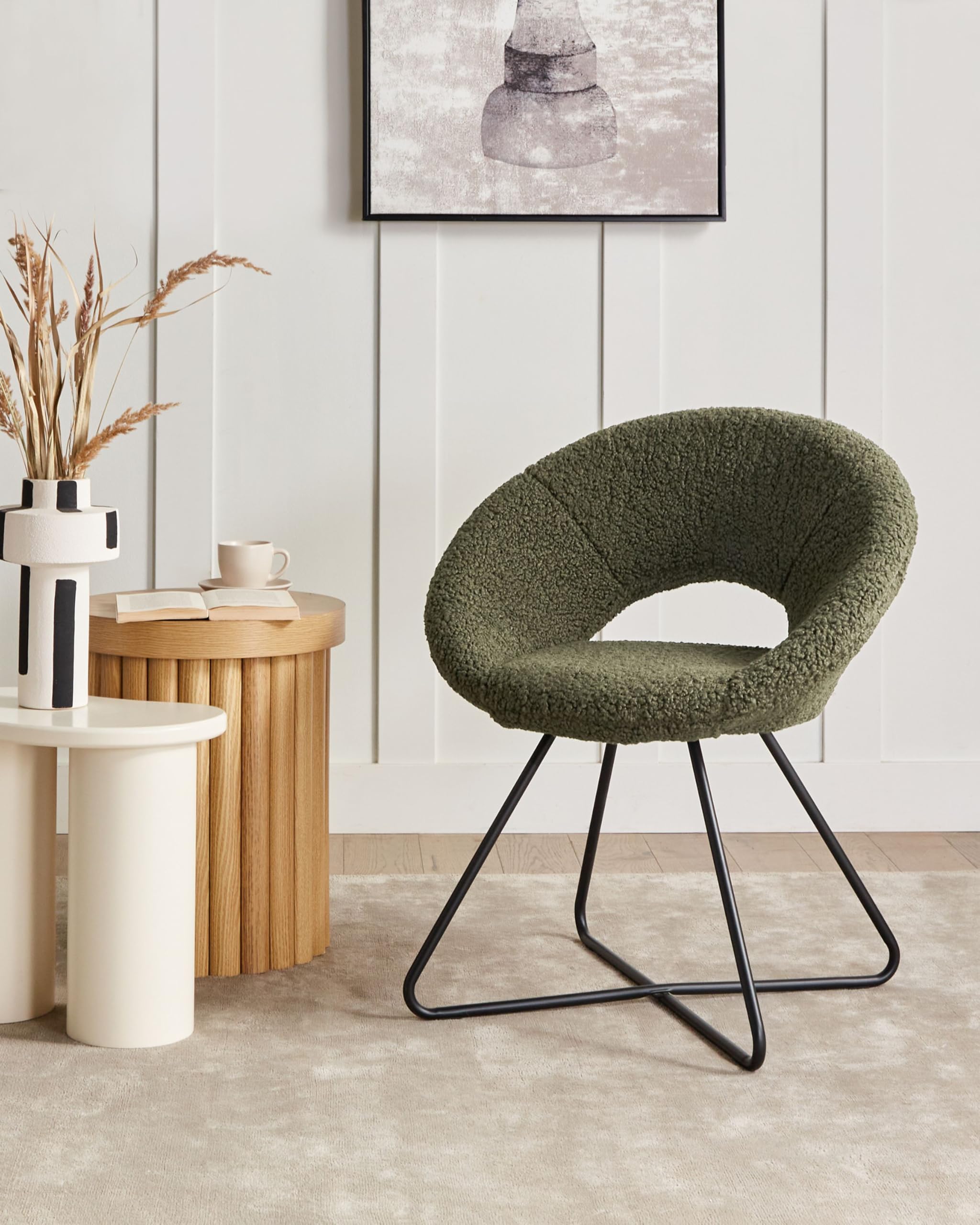 Beliani Sessel rund Bouclé grün mit schwarzem Metallgestell Kufen Glamourös Retro Rachel