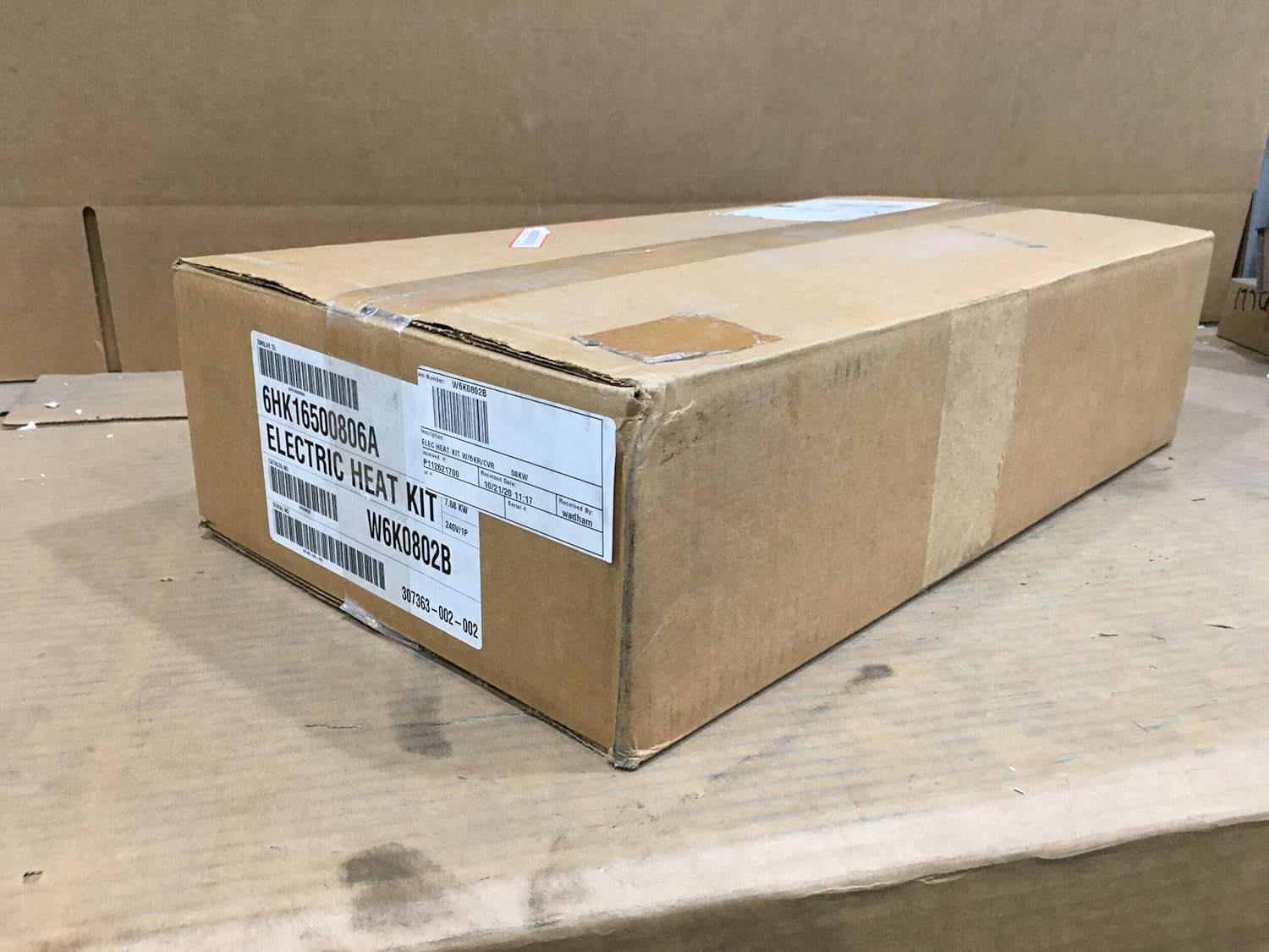 The W6K0802B Electric Heat Kit packaged in its original brown cardboard box.