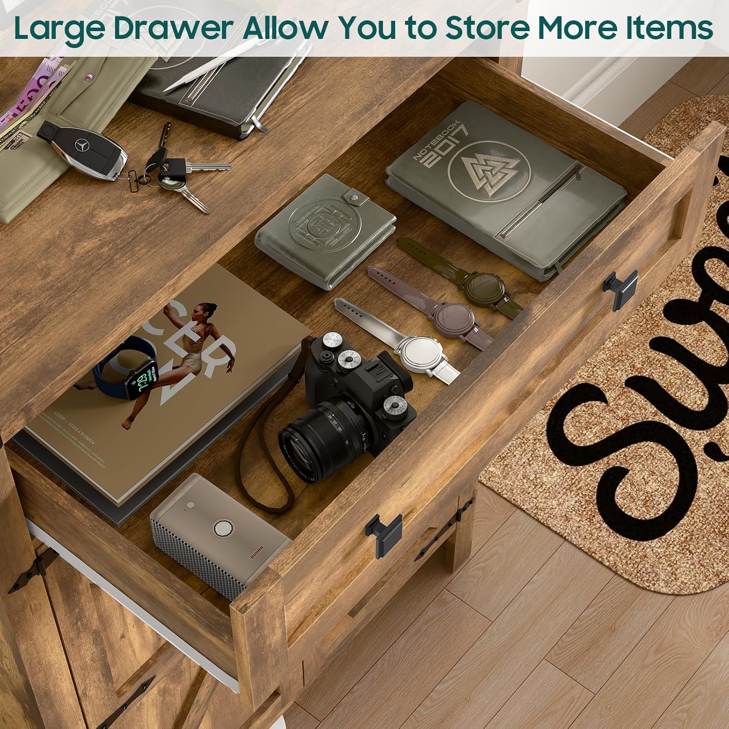 Close-up image of the open top drawer of the Vabches shoe cabinet, showing various small items like keys, a wallet, and a notebook stored inside.