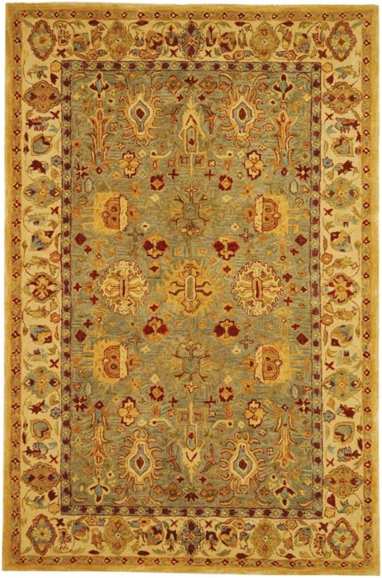 Ivory and Blue Hand Tufted Wool 4' x 6' Area Rug
