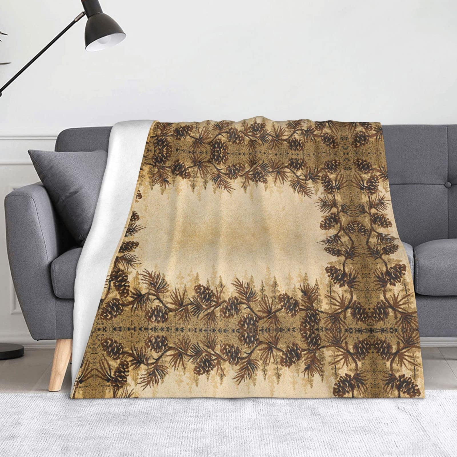 Couverture en flanelle de microfibres douce avec bordure pomme de pin pour lit et canapé