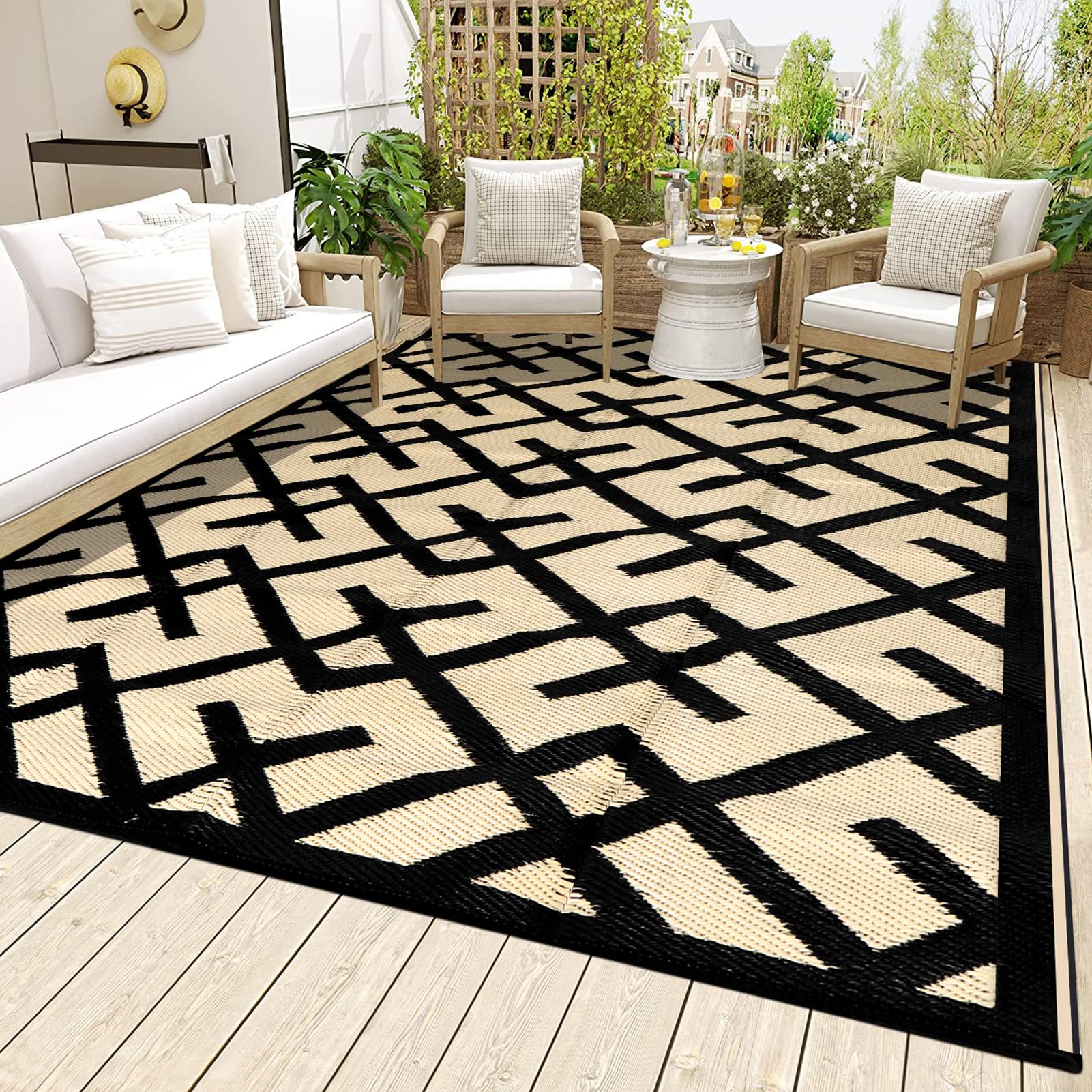 Photo 1 of LILIOFFIC Outdoor Rug Waterproof 9x12 ft Outdoor Carpet Patio Rug Mat Reversible RV Camping Rug Plastic Straw Rug Large Outside Outdoor Area Rug for Patio Deck Balcony Backyard Beach Black & Beige
