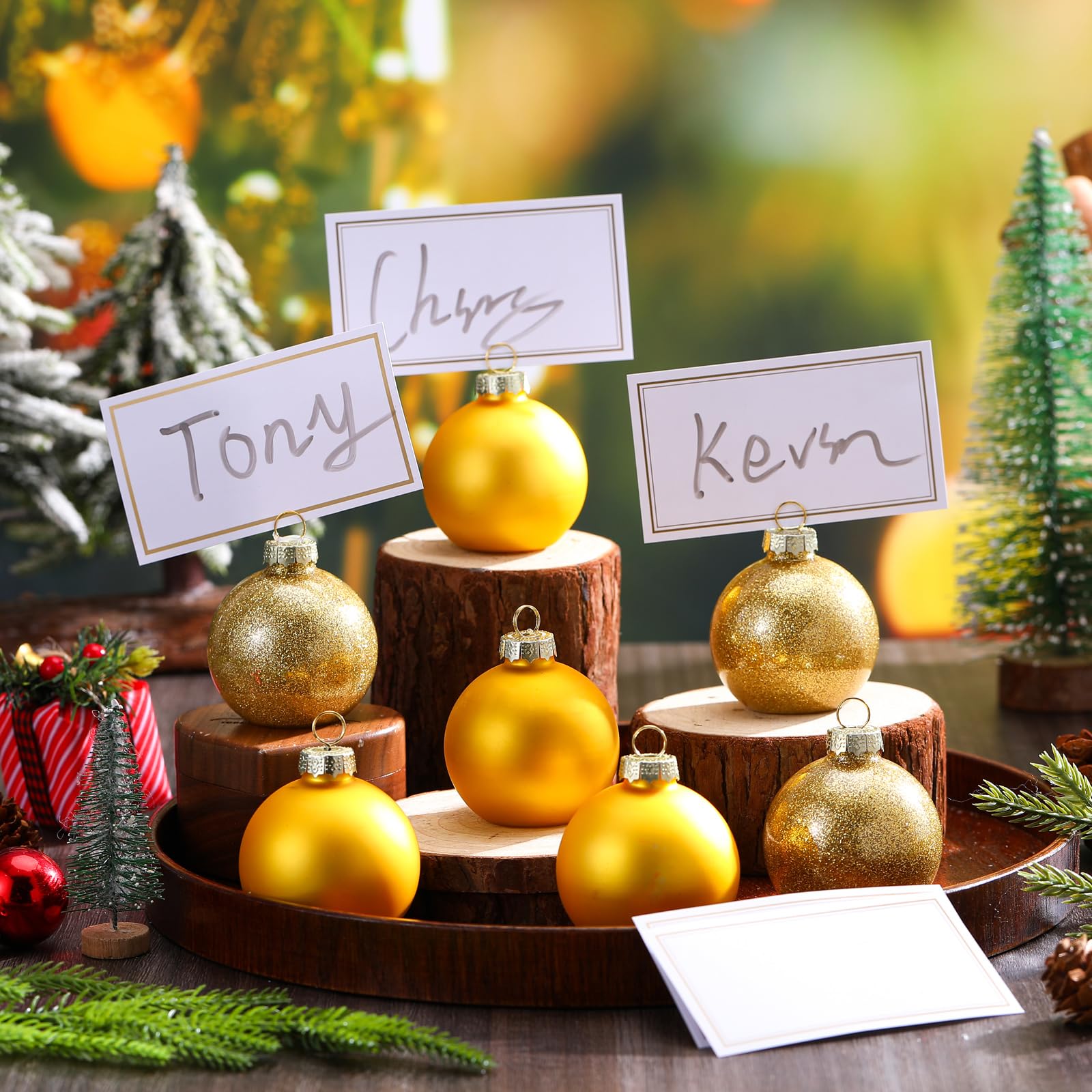 Holiday table with name cards and ornaments.