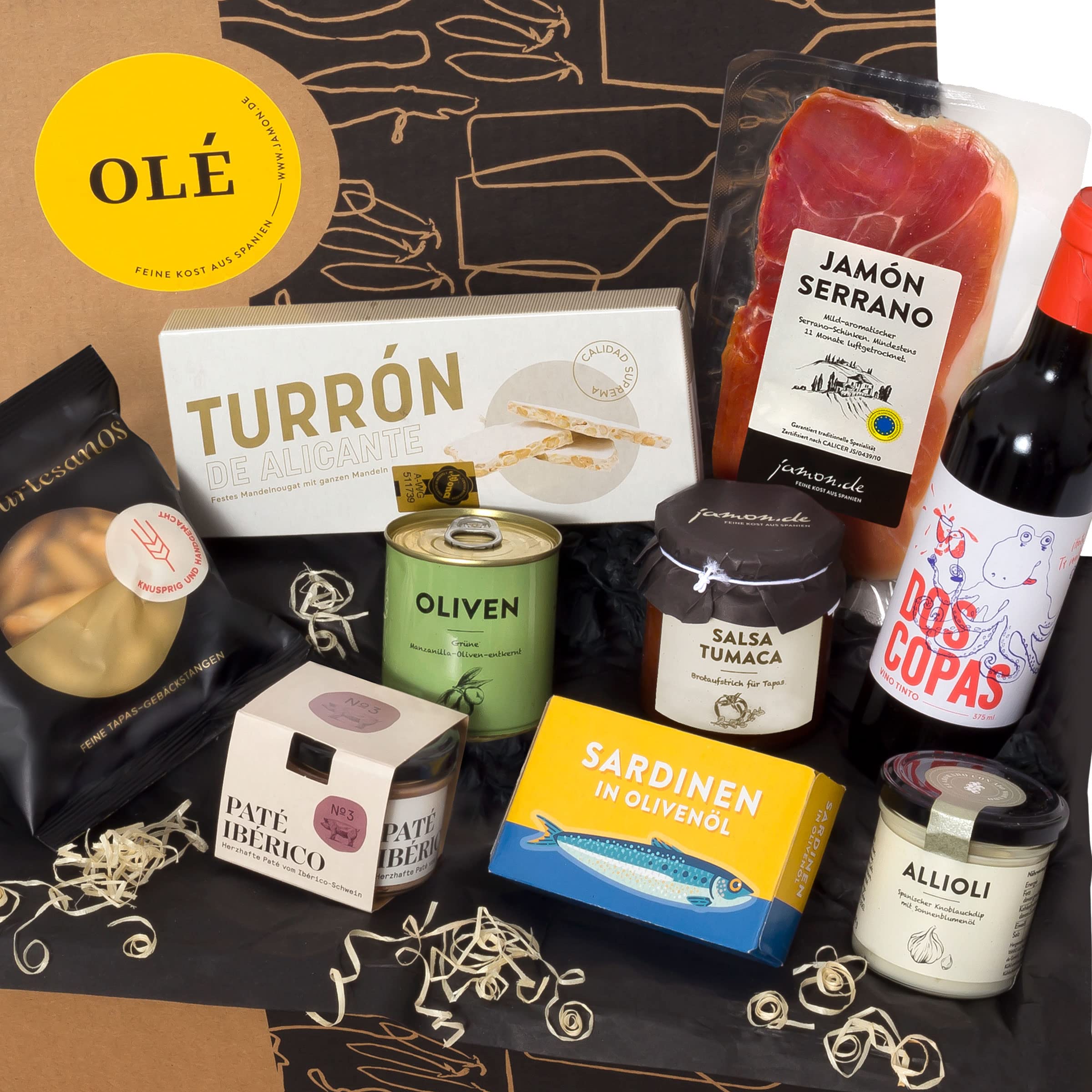 Geschenkbox Olé gefüllt mit spanischen Delikatessen Serrano-Schinken Tapas-Klassiker Rotwein