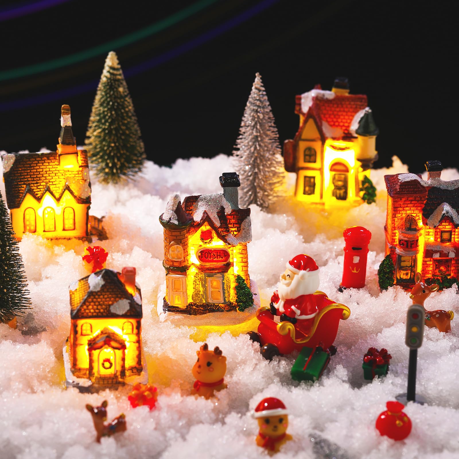 Liliful Lot de 40 maisons de village de Noël lumineuses à LED avec figurines en résine - Bâtiments de collection de Noël miniatures - Scène de ville de Noël - Décoration de bureau