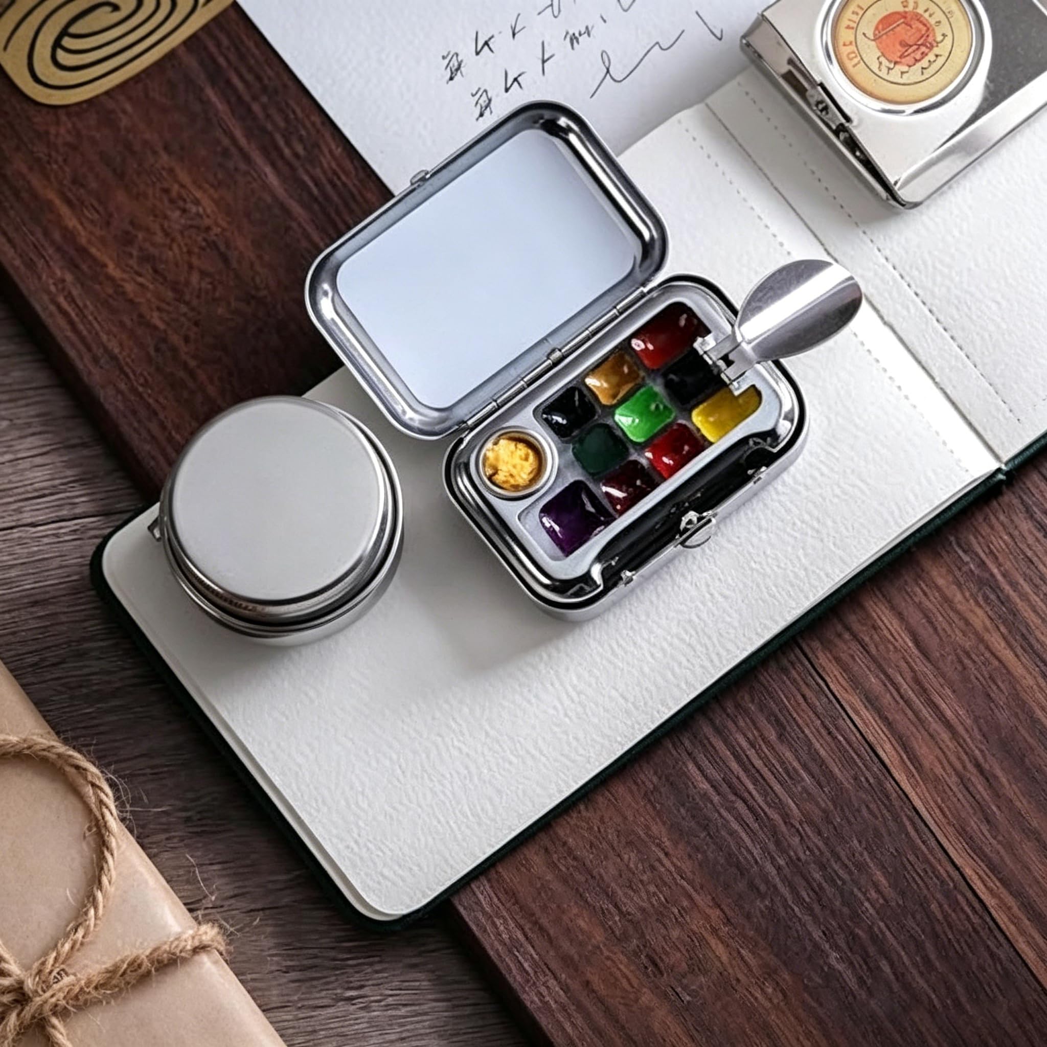 TsoLay Tragbares Aquarell-Skizzenbuch-Set, Metall Malkasten mit 10 Farben, Pinsel, Becher, Aquarellbuch, Reise-Malkit für Anfänger und Kunstbegeisterte, Kompaktes Set für Unterwegs Malerei