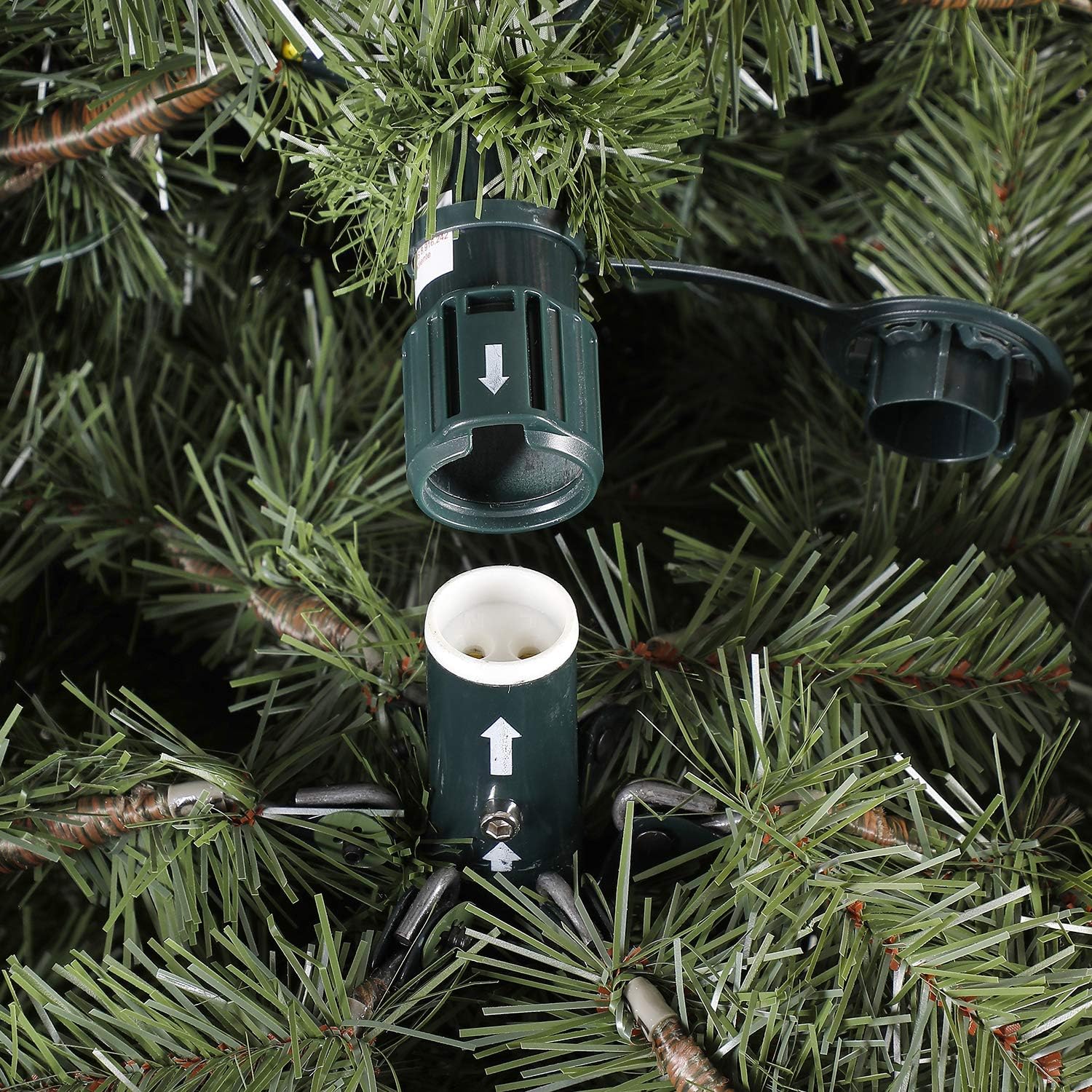 Green On/Off foot pedal switch connected to the tree's power cord.