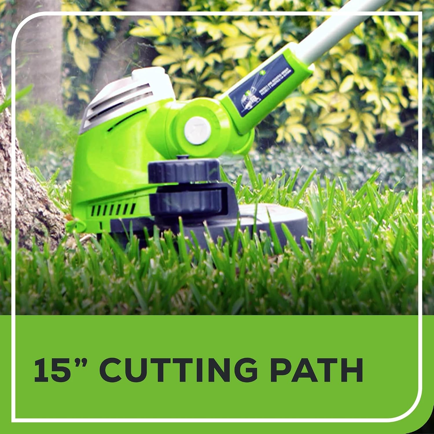 Greenworks string trimmer cutting grass along a path, demonstrating its 15-inch cutting path.