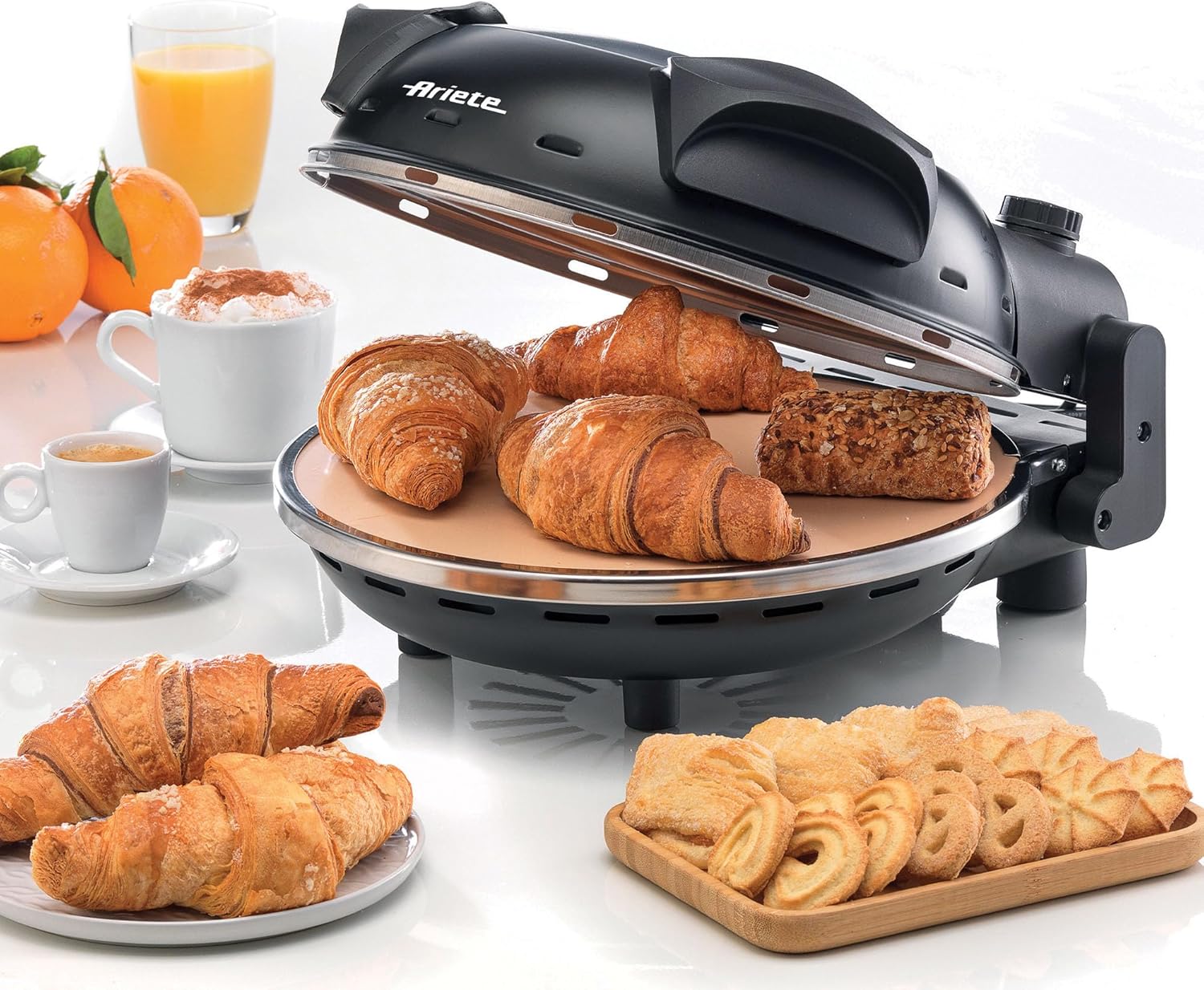Ariete 928 Electric Pizza Oven open with croissants and pastries