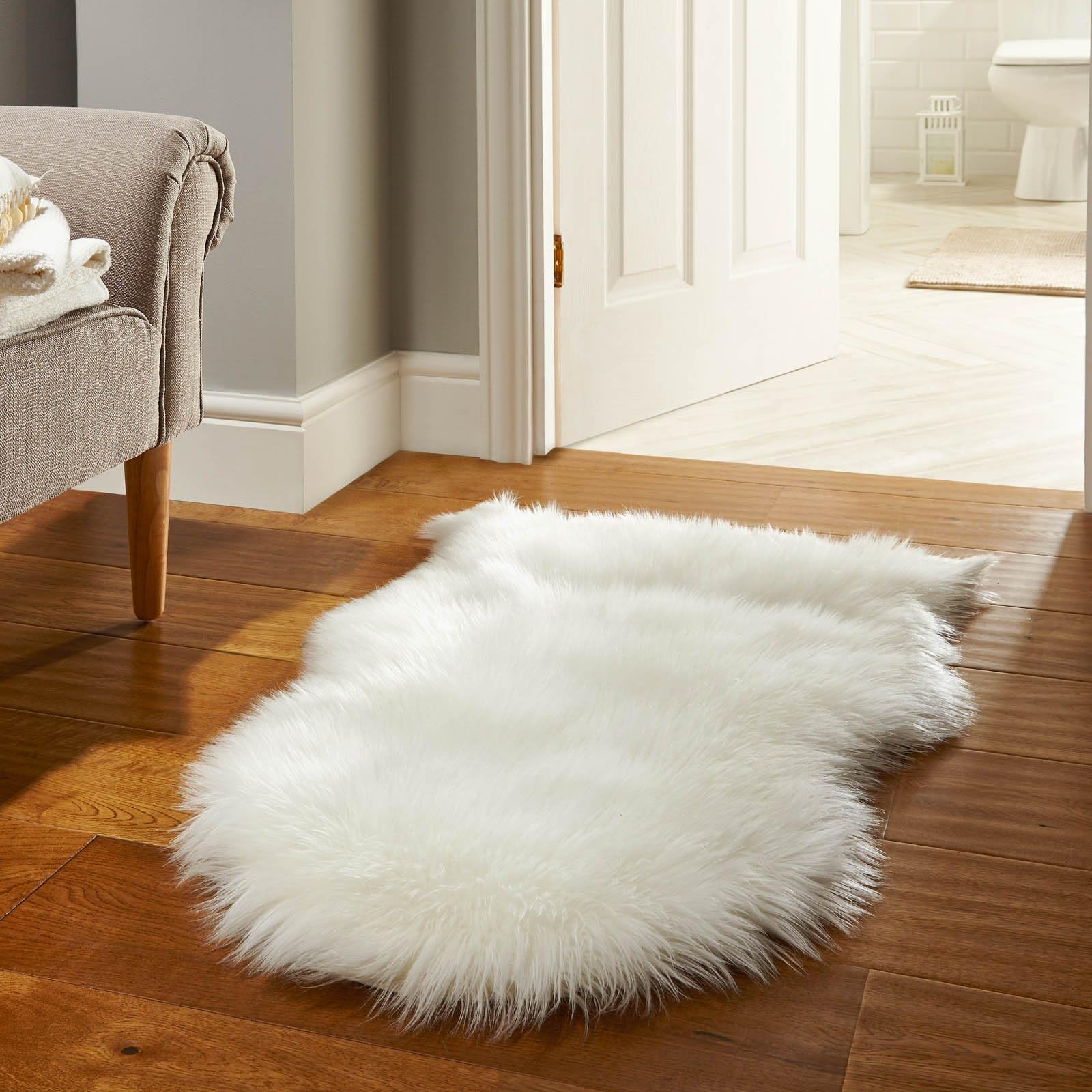 Luxe Furs Ultra-Soft Faux Fur Sheepskin Rug: Genuine Ivory Pelt, Perfect Chair Cover and Seat Cushion Pad, Area Rug for Couch, Living Room, or Bedroom Floor, 2ft by 3ft (24” x 36”)