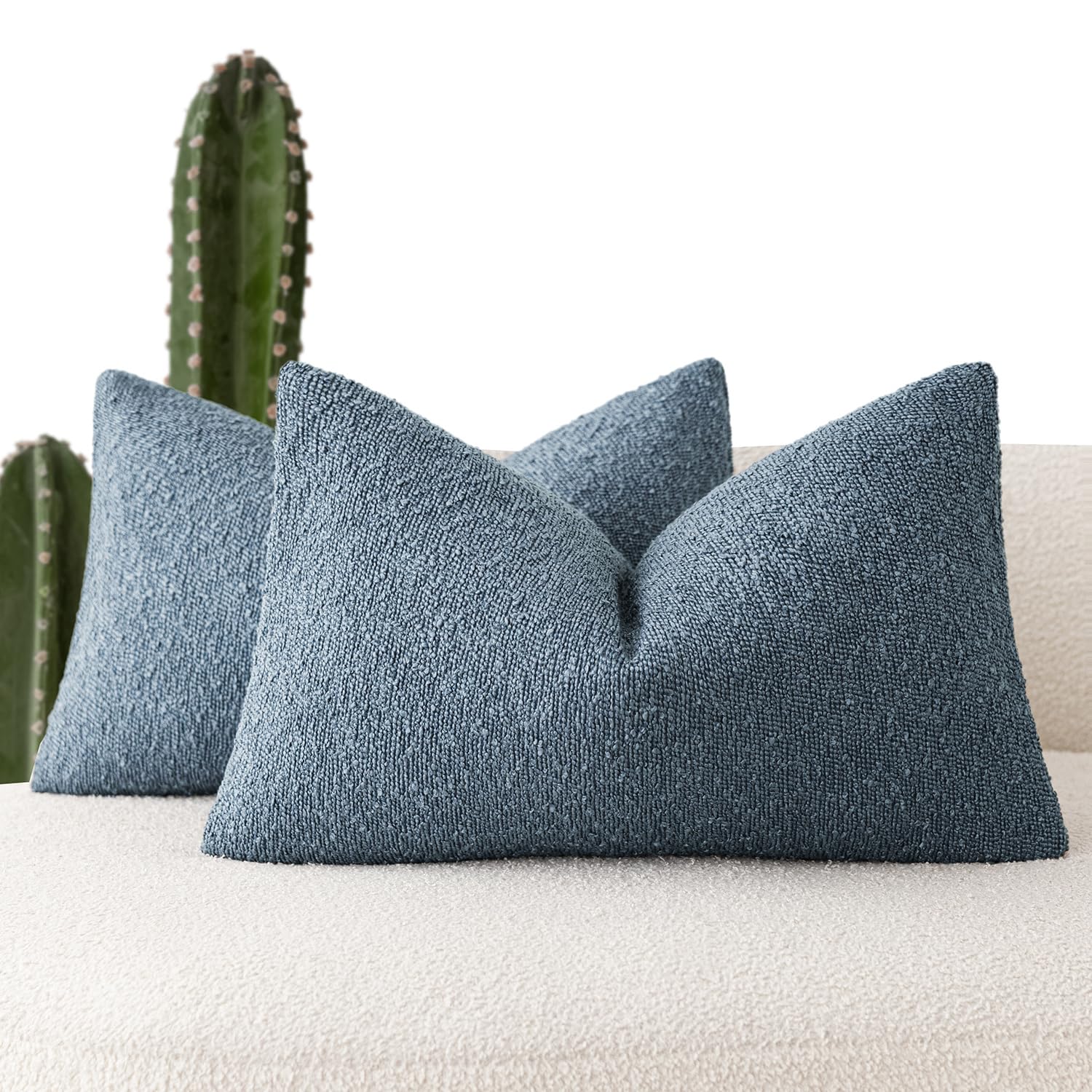 Housses de coussins confortables en boucle pour créer un coin lecture cosy dans la chambre