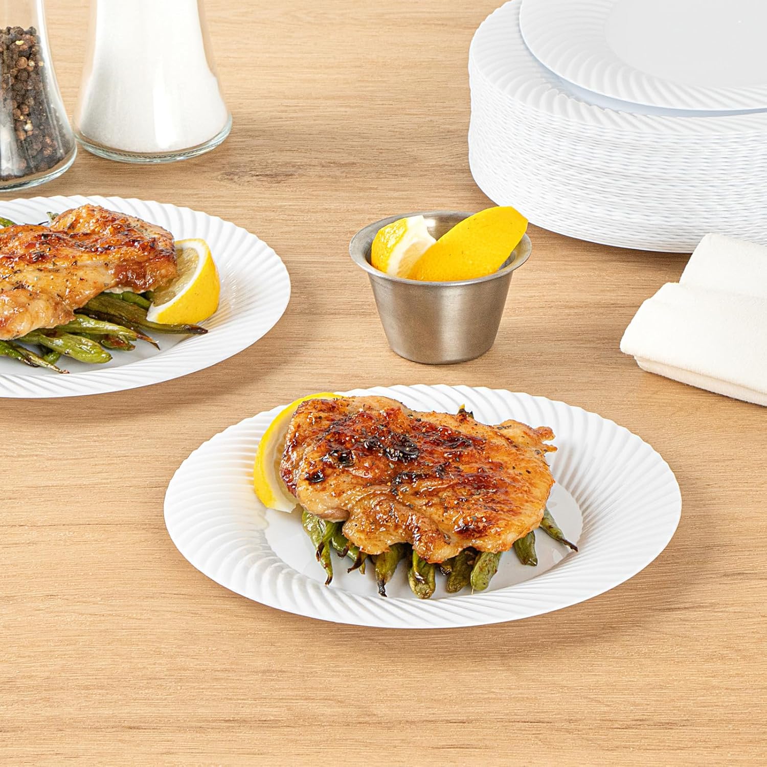Restaurantware Moderna 7 Inch Premium Disposable Plates, 200 Round Plastic Plates For Parties - Wave Pattern, Heavy-duty, White Plastic Dinner Plates, For Warm And Cold Foods, Ideal For Cafes