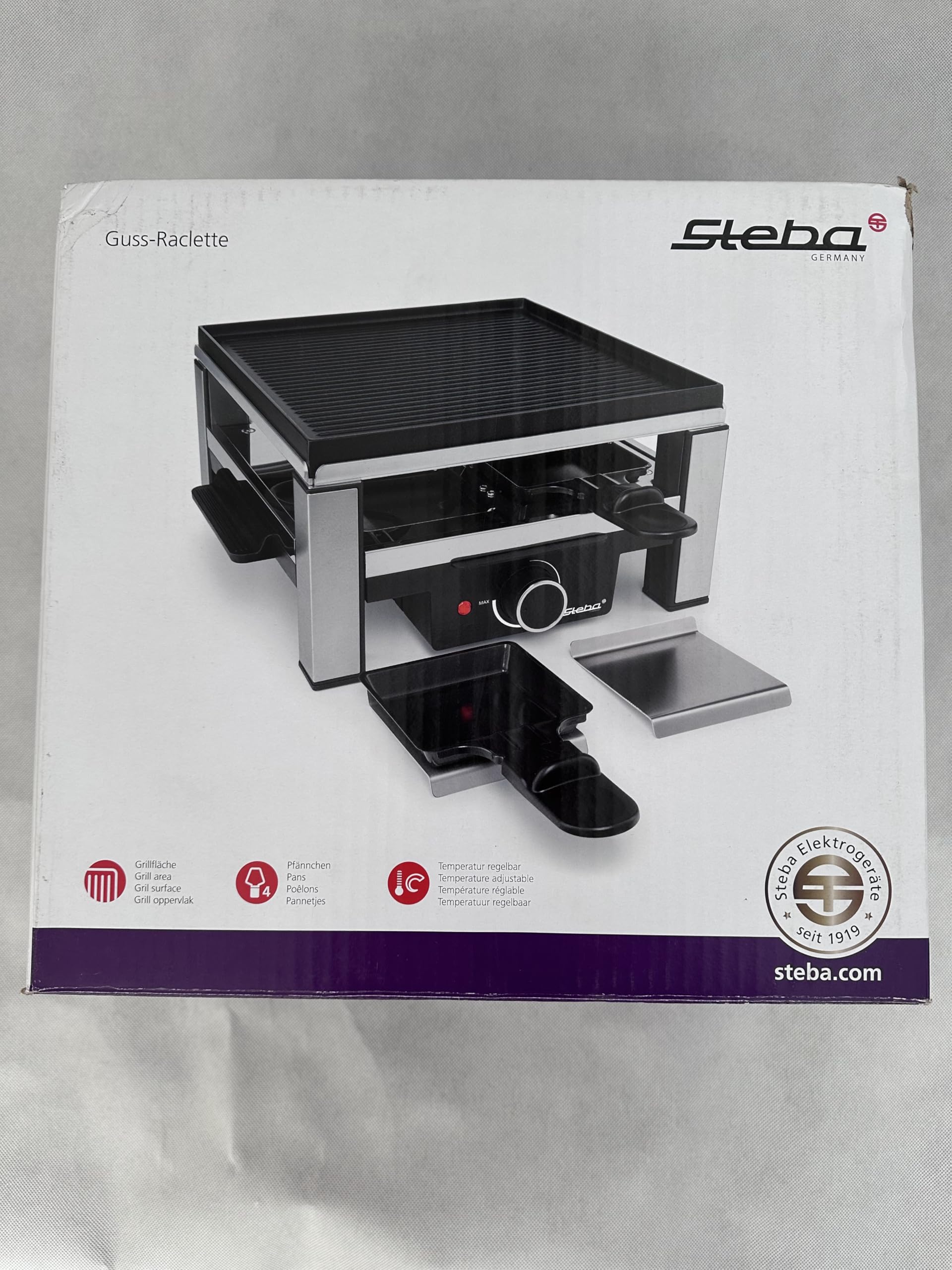 Raclette de hierro fundido Steba con una superficie para asar de 25 x 25 cm, 4 sartenes con revestimiento antiadherente para una limpieza fácil. RC 104.