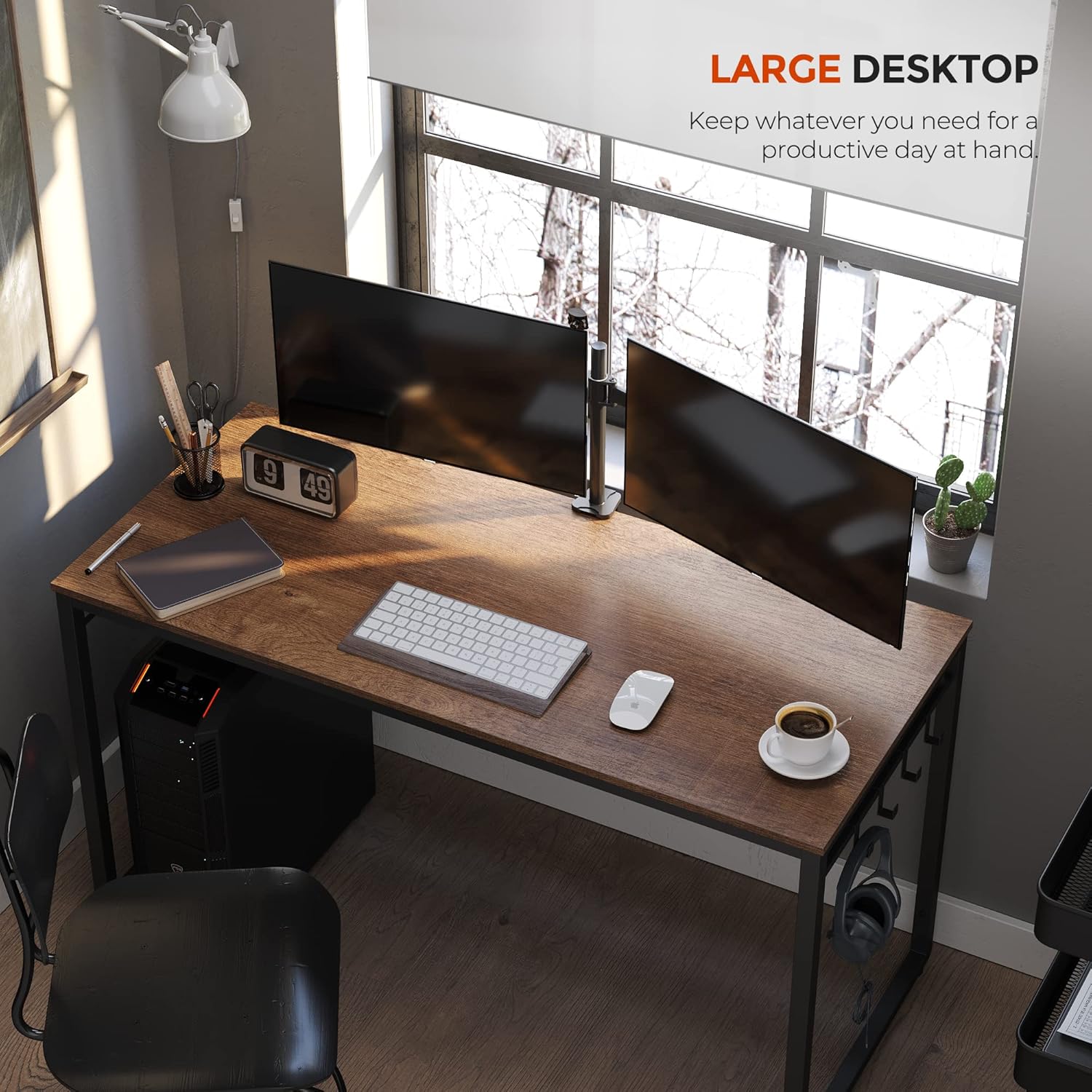 Minn fuq għal isfel view of the VASAGLE desk with two monitors, keyboard, mouse, and other office items, highlighting the large desktop space.