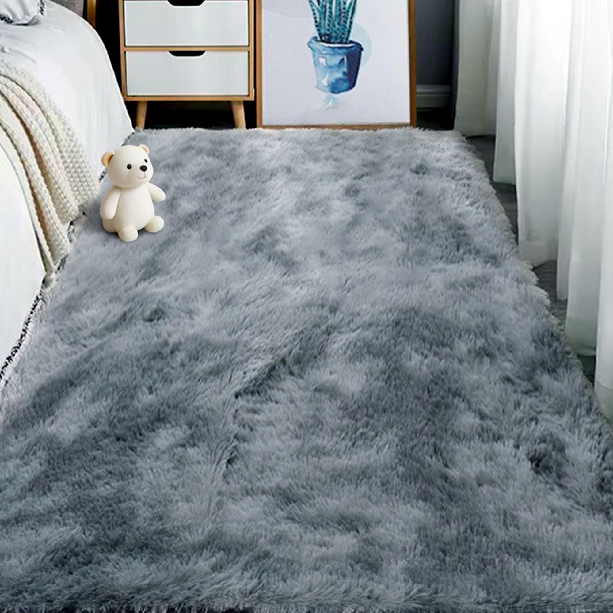 Tapis de chambre et salon gris clair pour créer un coin douillet