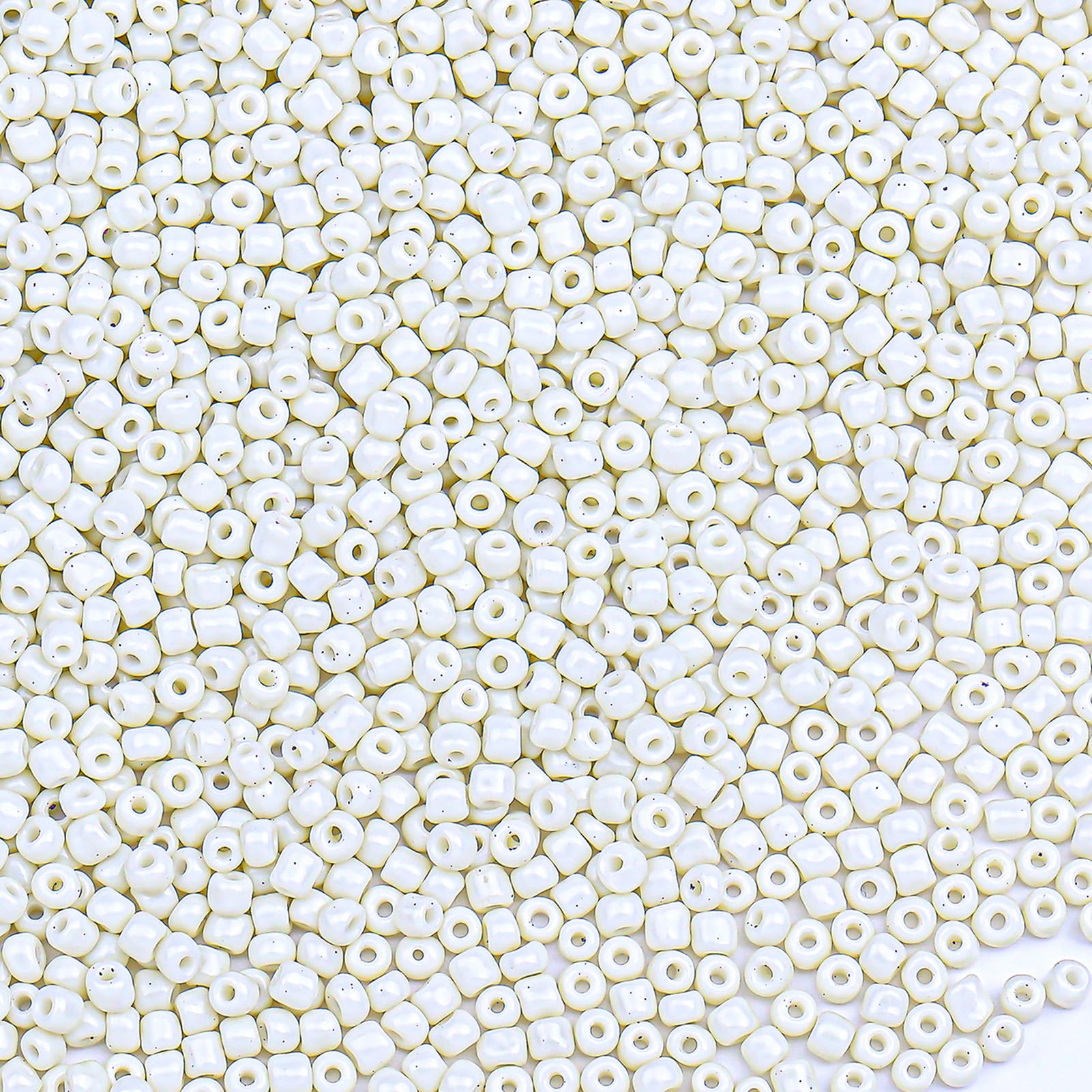 Photo 1 of 10000pcs 2mm Glass Seed Beads Bulk, Individual Color 12/0 Mini Pony Spacer Small Seed Beads for DIY Bracelet Necklaces Wrist Jewelry Making, Beige White