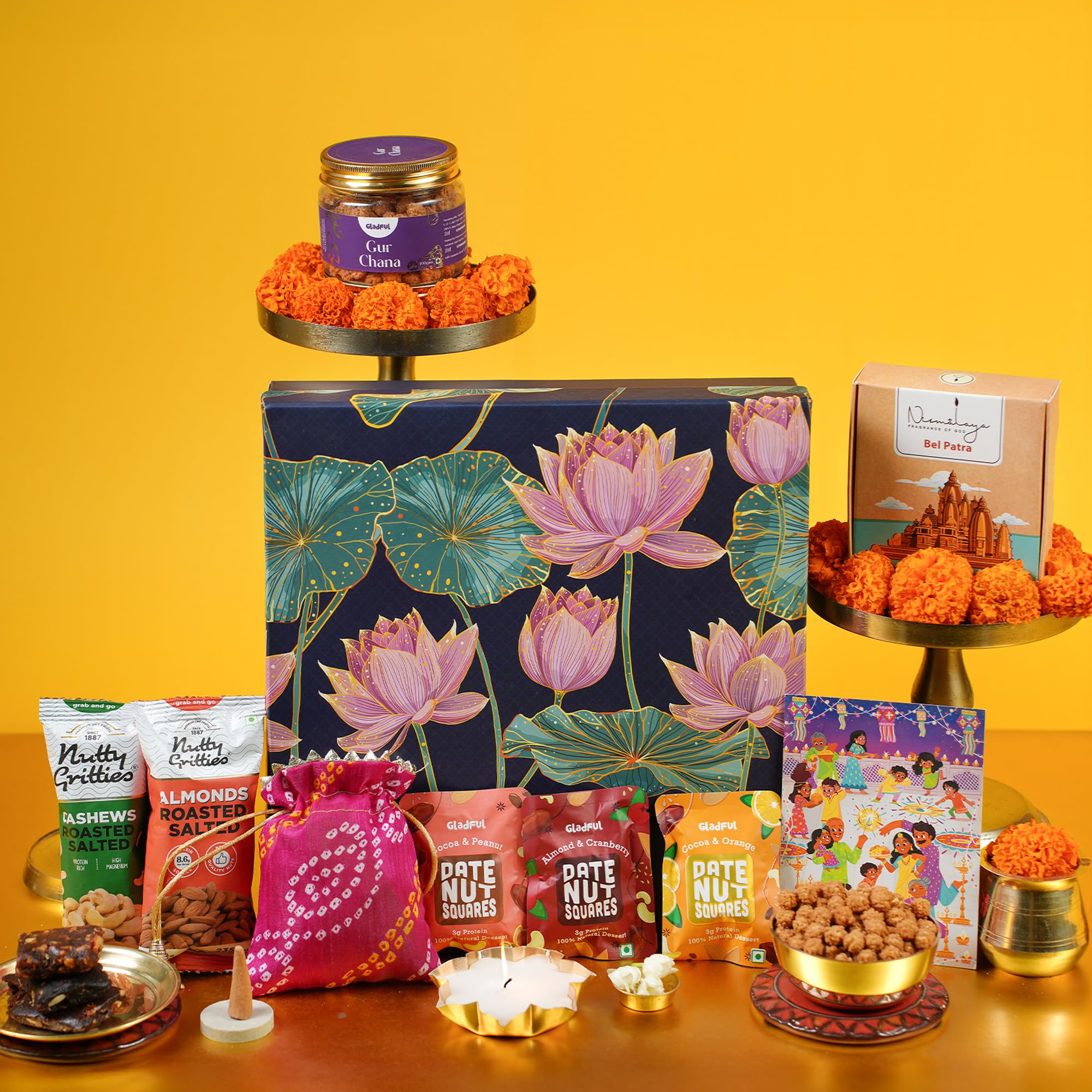 Divine Indulgence 10 Item Diwali Gift Box | Gur Chana, Roasted Almonds, Roasted Cashews, Dry Fruit Burfi, Incense Cones, Decorative Diya with Holder, Greeting Card & Festive Potli
