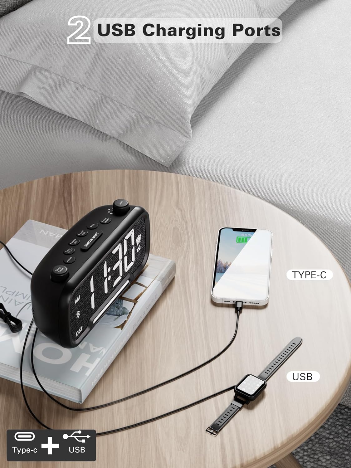 Mesqool CR1025 Alarm Clock Radio with a smartphone and smartwatch connected to its USB-C and USB-A charging ports.