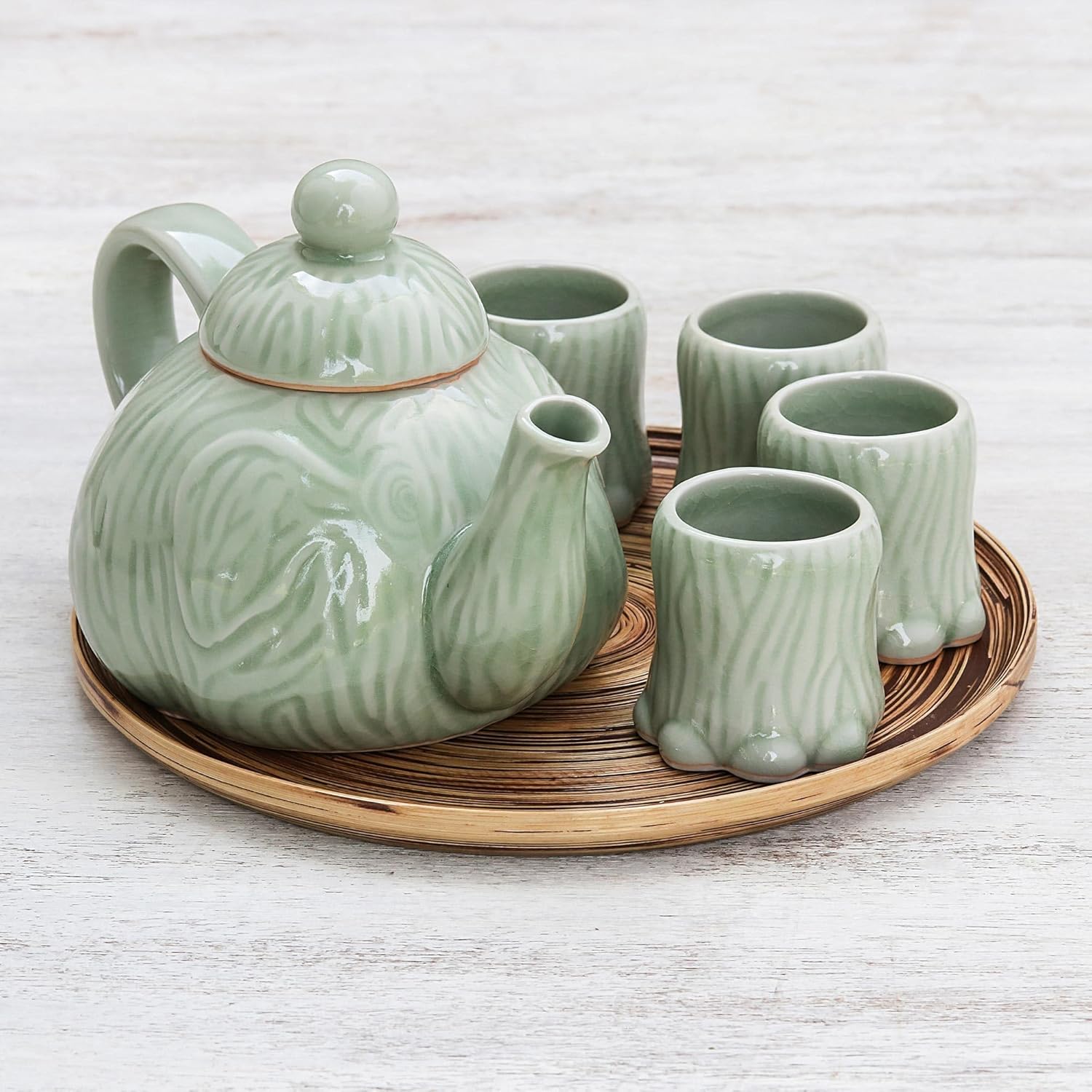 NOVICA Artisan Handmade Ceramic Tea Set Celadon Elephant Bamboo Tray for 4 Thailand Tableware Serveware Coffee Service Animal Themed [teapot 5in H x 8.5in W x 5.25in D Teapot 20 Oz. Cups 2.4in H x 2.]