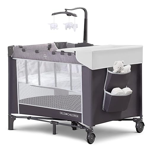 Delta Children LX Deluxe Play Yard - Cuna portátil para bebé con un moisés extraíble y mesa cambiadora Eclipse