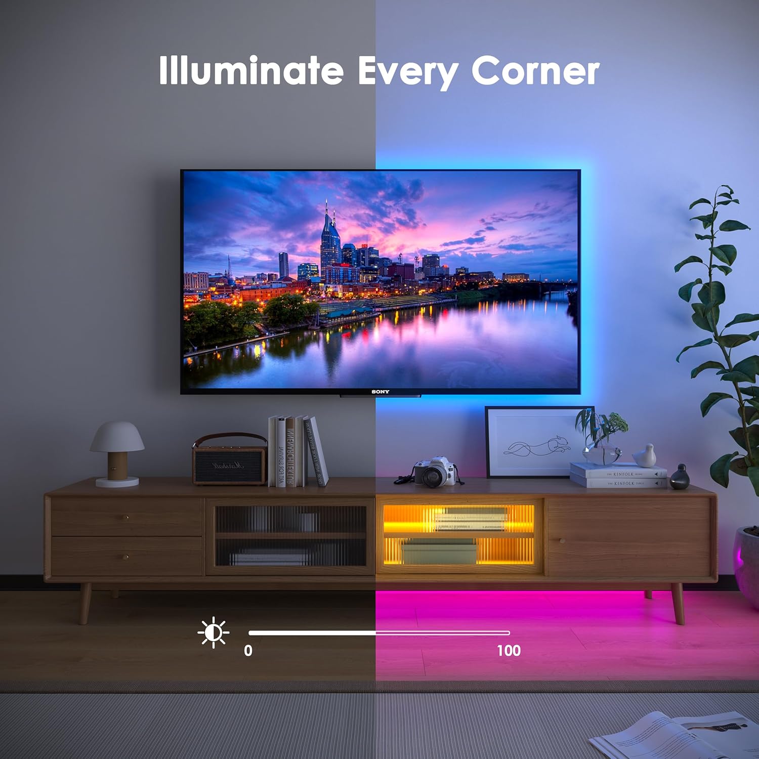 Living room with a TV and media console, showing LED strip lights installed behind the TV and under the console, illuminating the area with soft, colorful light.