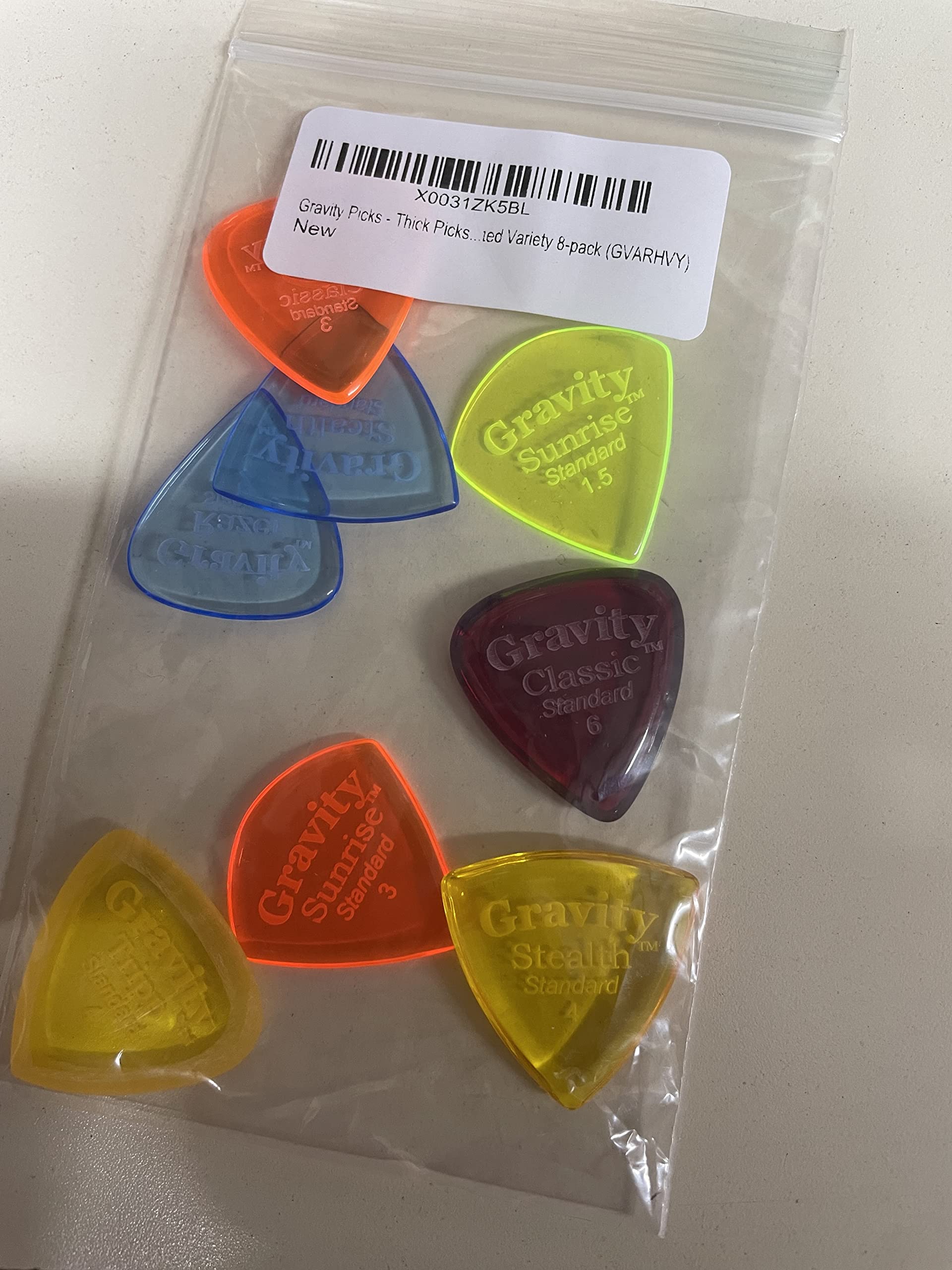 Gravity Plettri per chitarra in acrilico, smussi lucidati, suono più luminoso e più forte e presa più stretta, disponibili in diverse confezioni, prodotti negli Stati Uniti