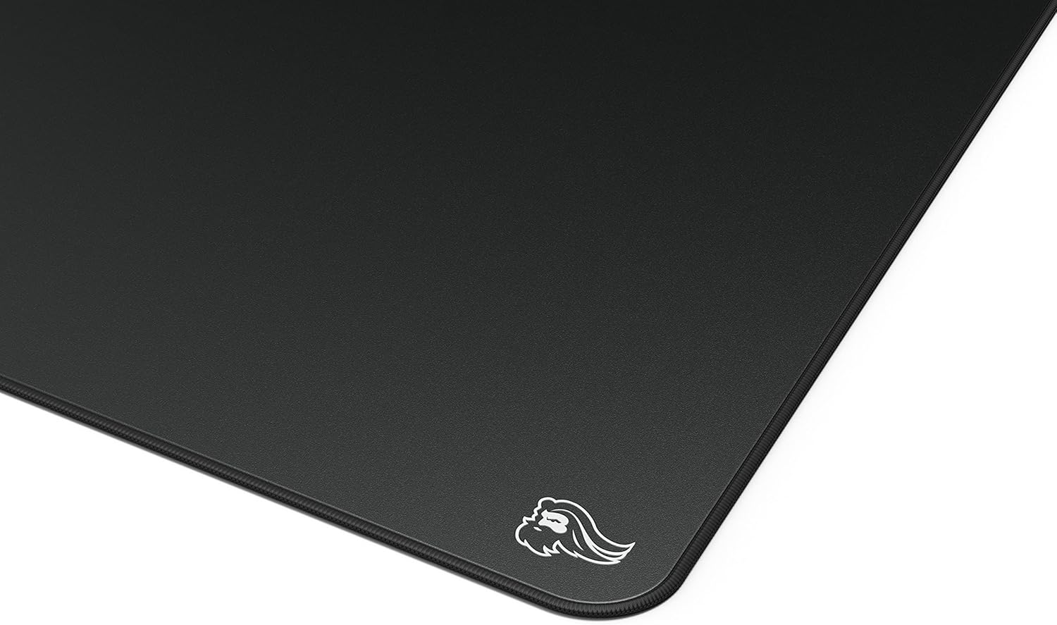 Close-up of the Glorious Elements Fire Gaming Mousepad surface and stitched edge.