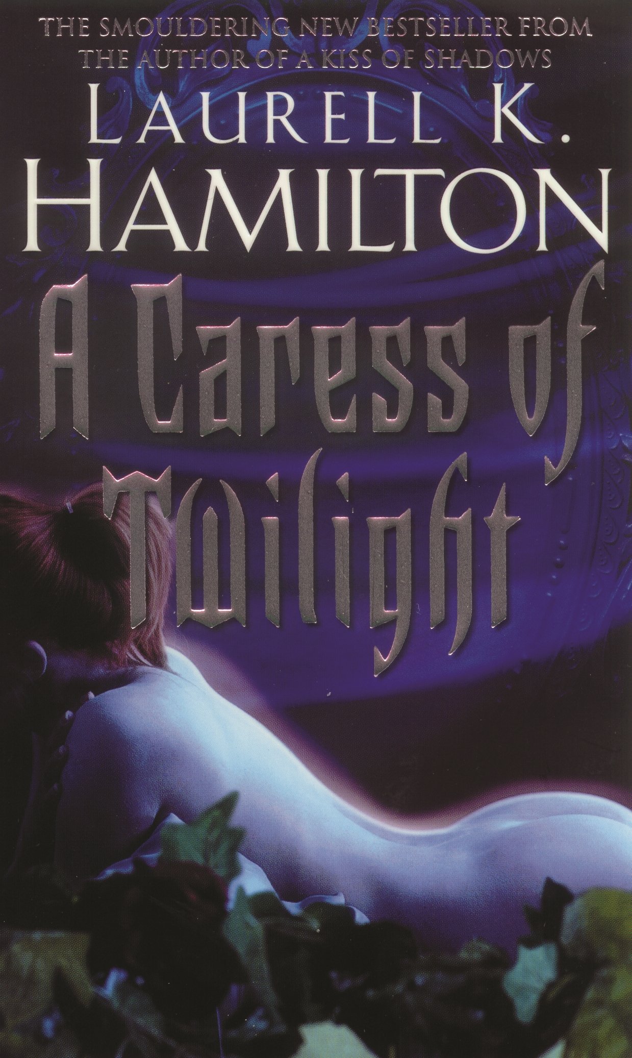 A Caress Of Twilight (Merry Gentry 2: Faeries, The Fey) by Laurell K. Hamilton