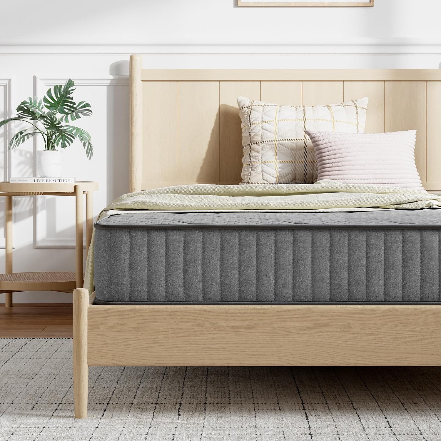 Novilla 8-inch Twin Hybrid Mattress on a wooden bed frame.