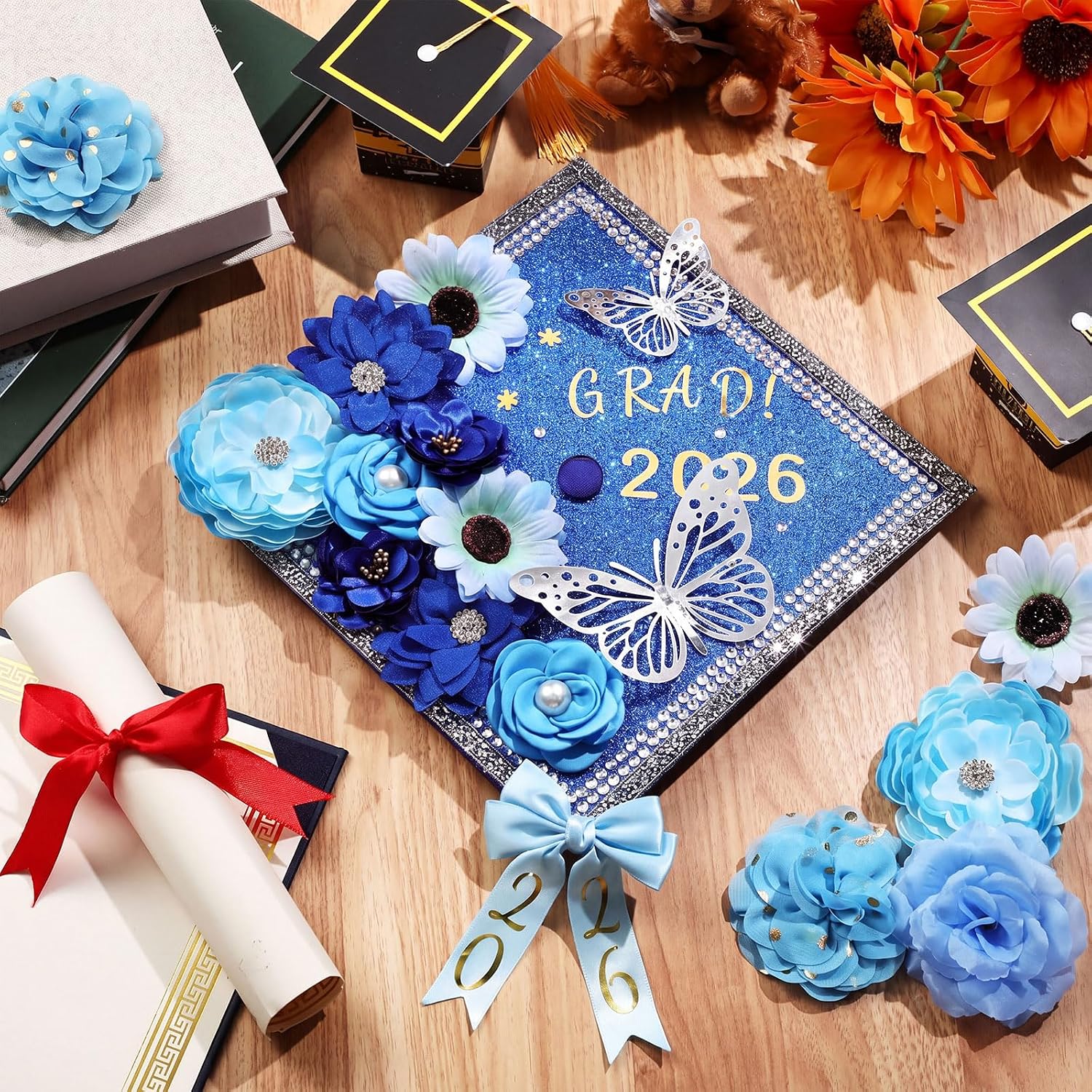 Wavwavw 62 Pcs DIY Graduation Cap Decorations Kit Include Faux Flowers 3D Butterfly Bow Self Adhesive Rhinestones and Alphabet Letter Stickers for 2026 Grad Cap Topper Decor Graduation Party(Blue)