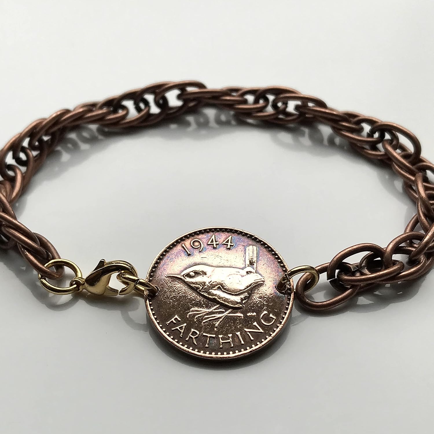 1944 United Kingdom Great Britain 1 Farthing coin bracelet wren Jenny bird British jewelry World War 2 era England London Manchester Birmingham Newcastle Bristol Sheffield Liverpool Leeds York b000004