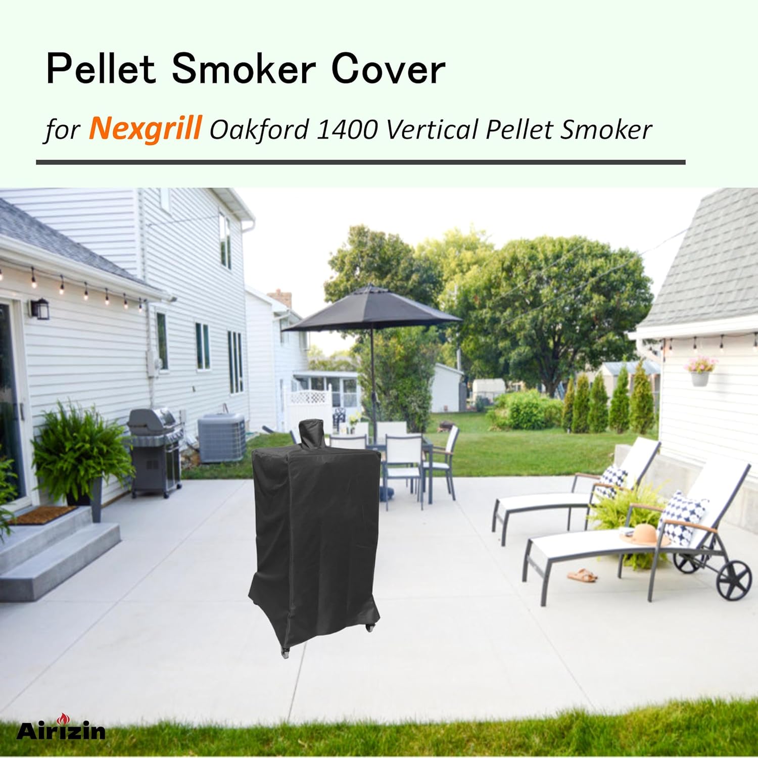 Vertical pellet smoker with the black grill cover installed, situated in an outdoor patio setting.