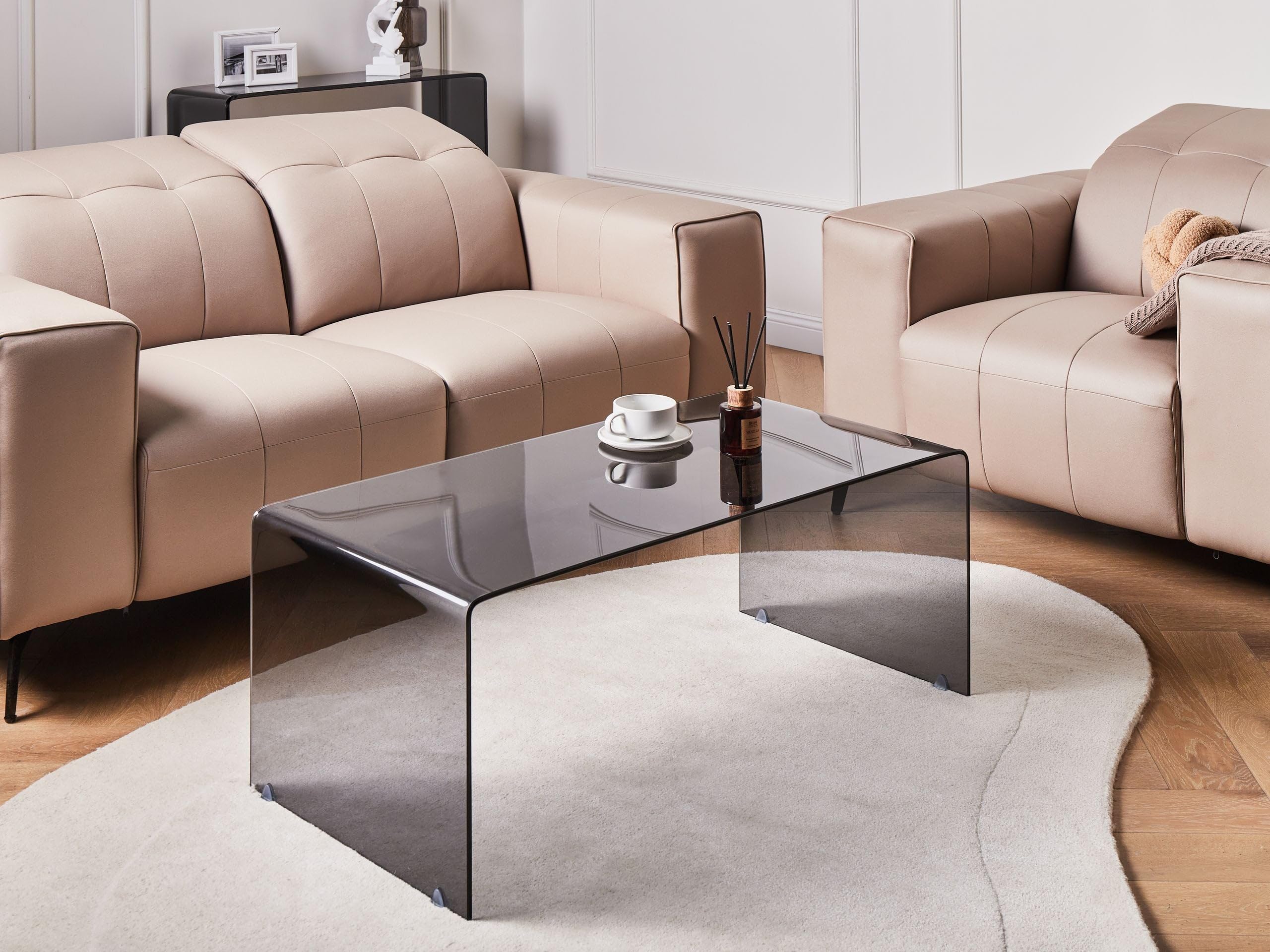 Beliani Minimalistischer Couchtisch transparent/schwarz Glas Kendall