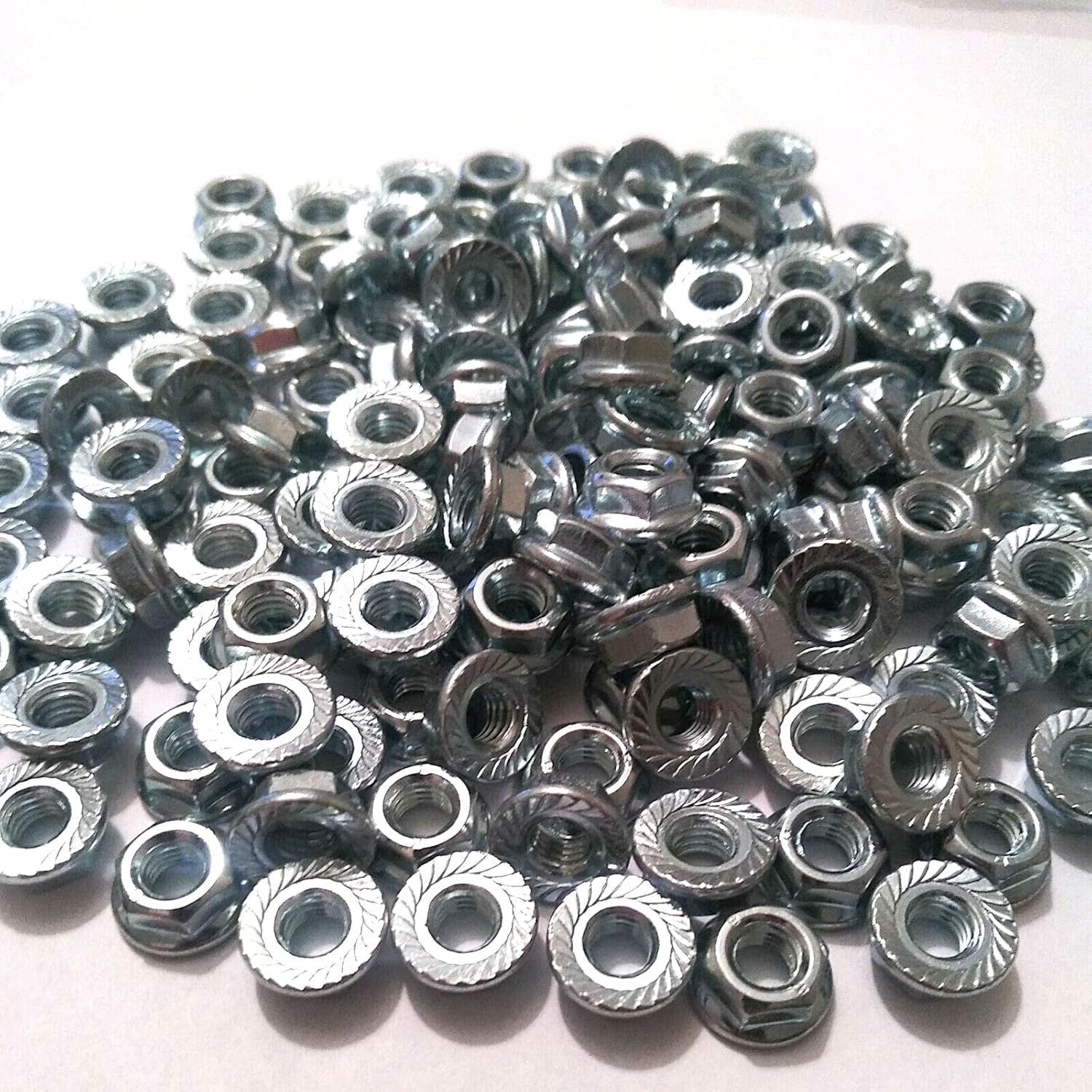 M6-1.0 / 6mm - Class 8 Serrated Hex Flange Nuts DIN Zinc (100)