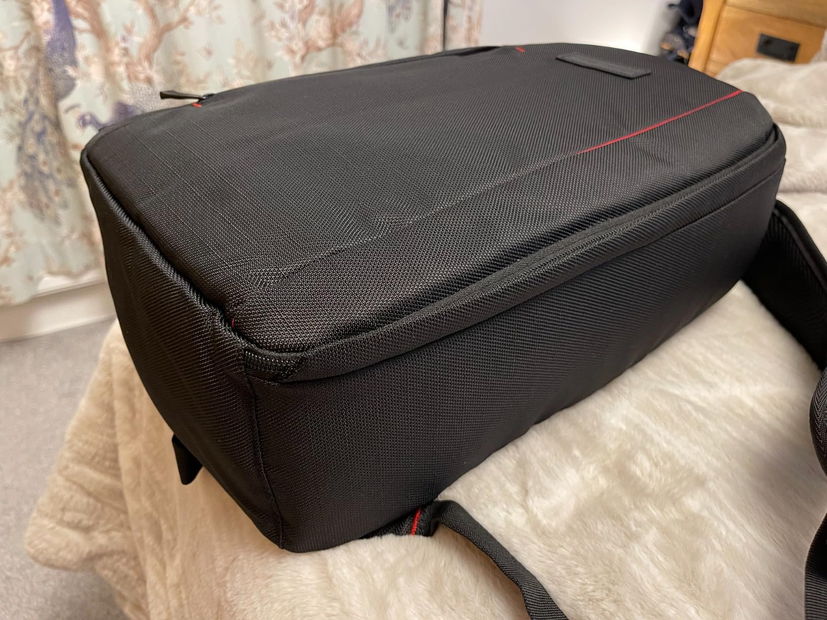 Decent size backpack for a DSLR with several lens and flash