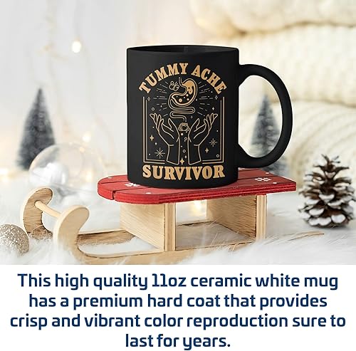 Miniatura 4 de Taza de café negra de 11 onzas con texto en inglés "Survivor Survivor"