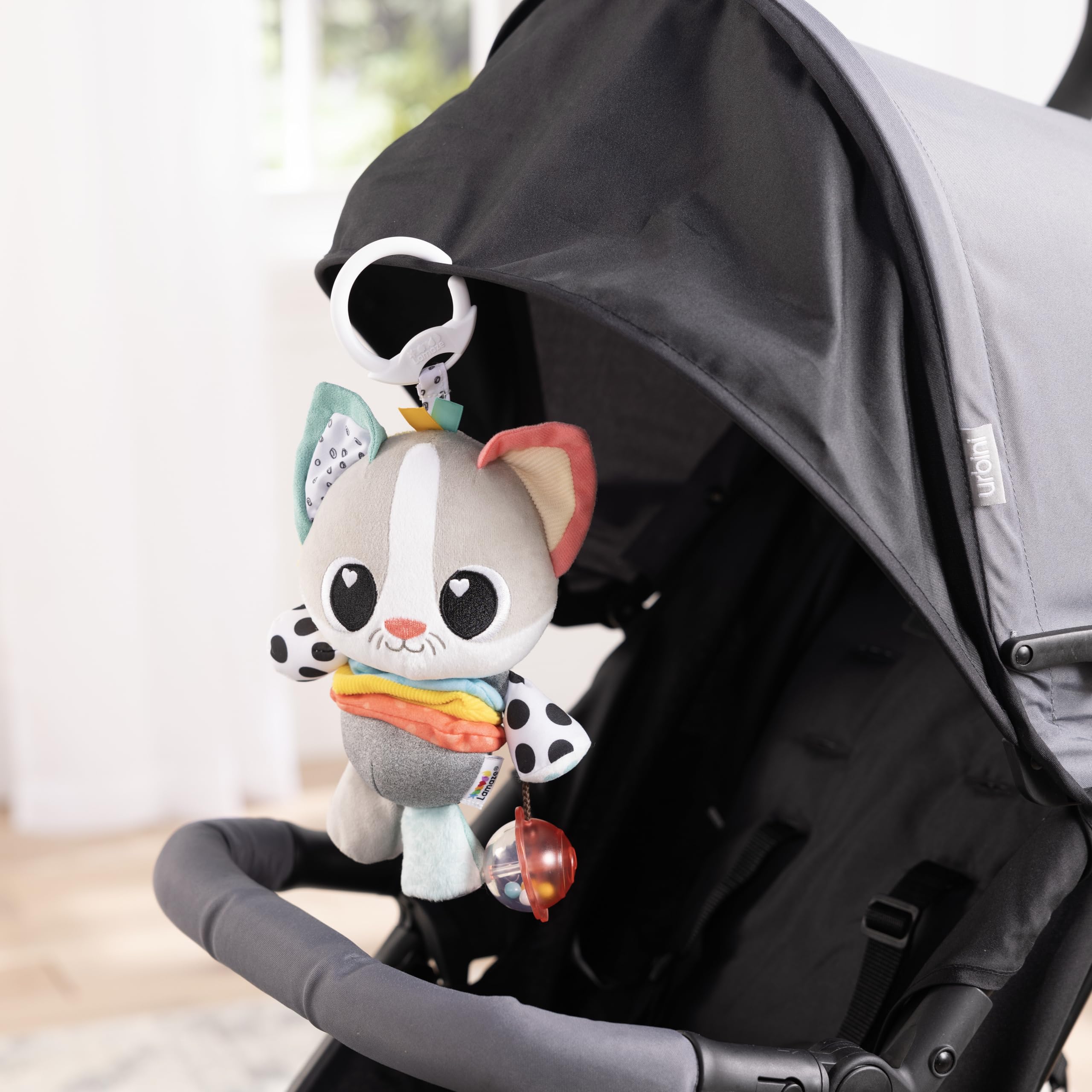 LAMAZE Millie the Cat, Clip and Go Baby Pram Toy with Multiple Textures, Rattle, Crinkle Ears, Satin Ribbons - Image 3