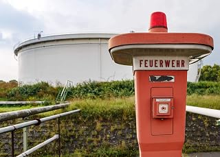 Home Comforts Cologne, Germany: Fire alarm pull station in a tank farm-20 Inch By 30 Inch Laminated Poster With Bright Colors And Vivid Imagery-Fits Perfectly In Many Attractive Frames
