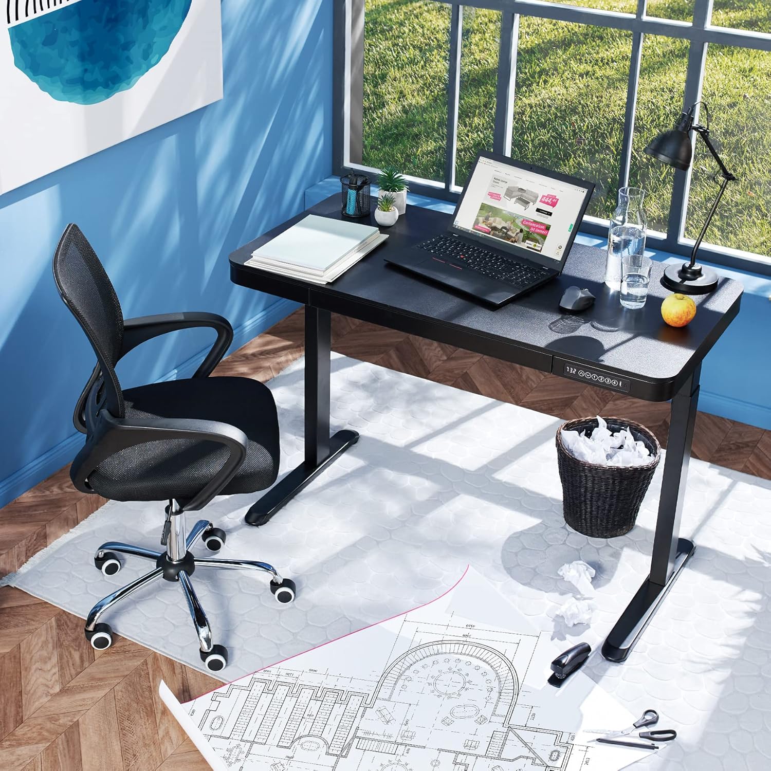 tectake Zola Electric Height-Adjustable Desk in an office setting with a laptop and chair.