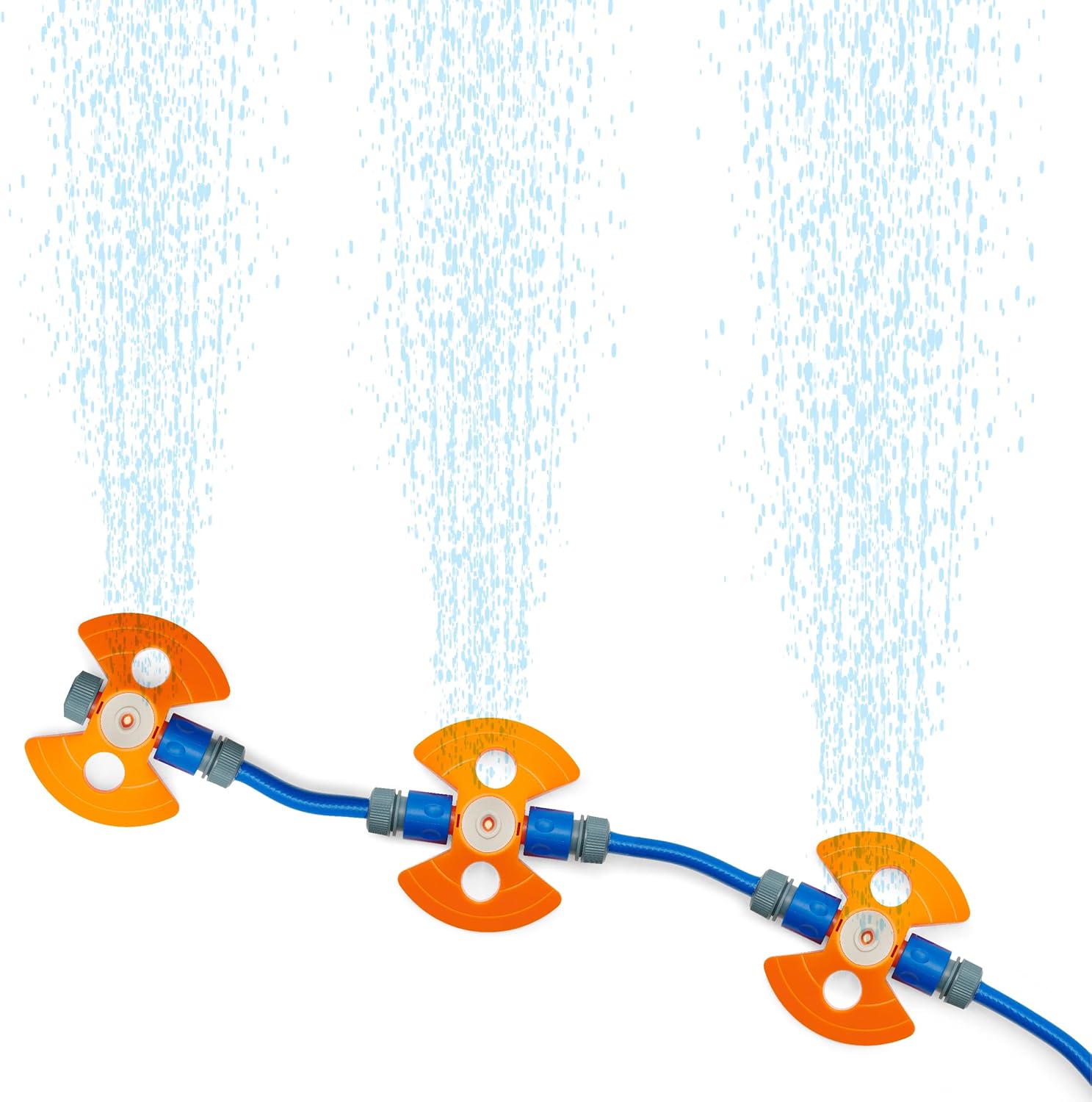 Nærbillede view of the three orange and blue water jets spraying water upwards, demonstrating the different water patterns.