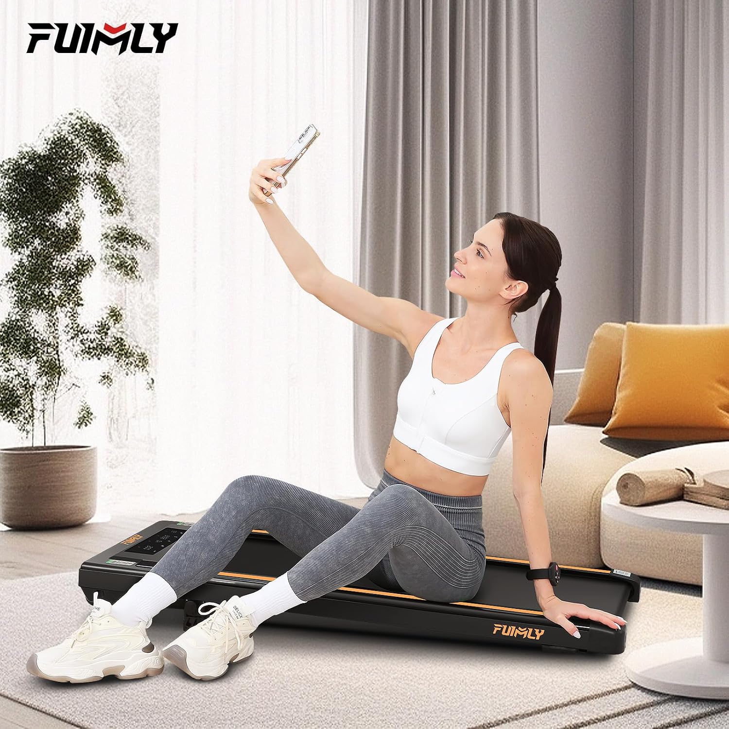 Image showing a woman easily moving the FUNMILY treadmill for storage, highlighting its flexible wheels.