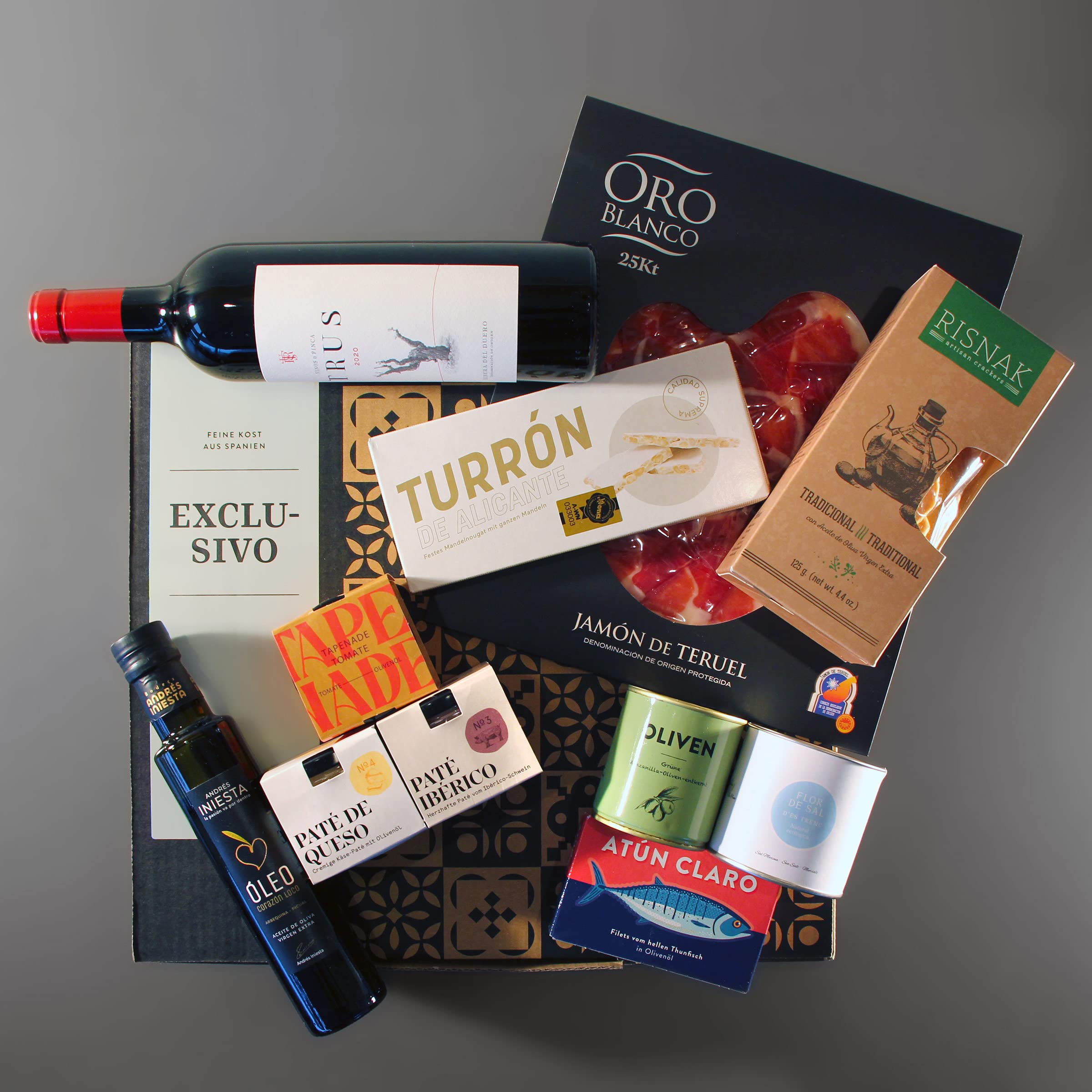 jamon.de Präsentkorb EXCLUSIVO, edle Feinkost im Geschenkkorb | Handgeschnittener Teruel-Schinken, edle Patés, Olivenöl, Flor de Sal, Thunfisch und Rotwein, Geschenk für Feinschmecker