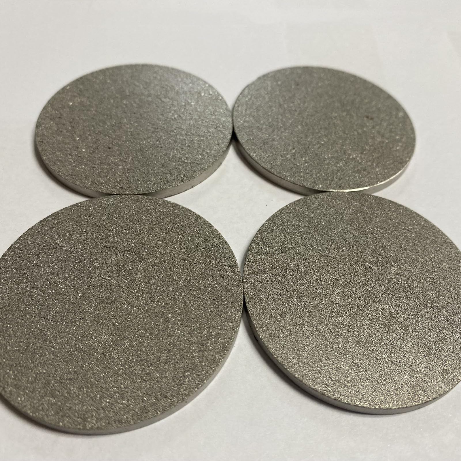 Plaque filtrante frittée en poudre métallique de haute pureté – 50 μm, diamètre 75 mm, épaisseur 2 mm for la filtration des gaz et des liquides