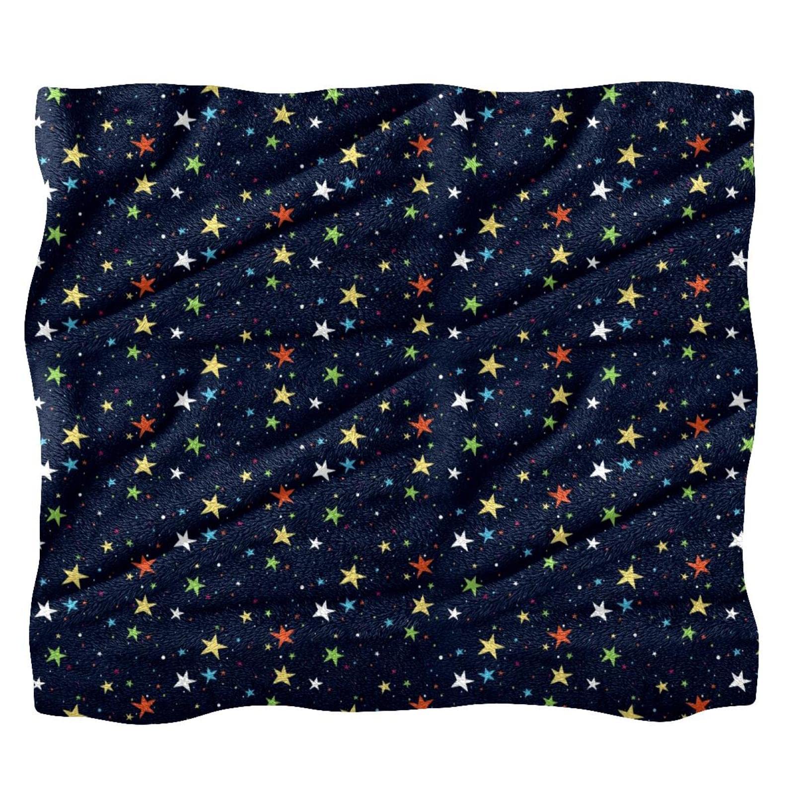 Couverture polaire colorée motif étoilé pour vos soirées cocooning au lit