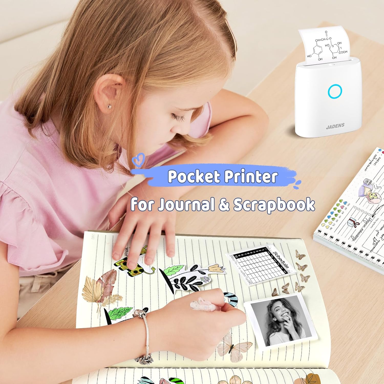 JADENS Mini Sticker Printer showing paper being loaded into the device.