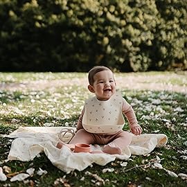 mushie Silicone Baby Bib | Adjustable Fit Waterproof Bibs (Bows)