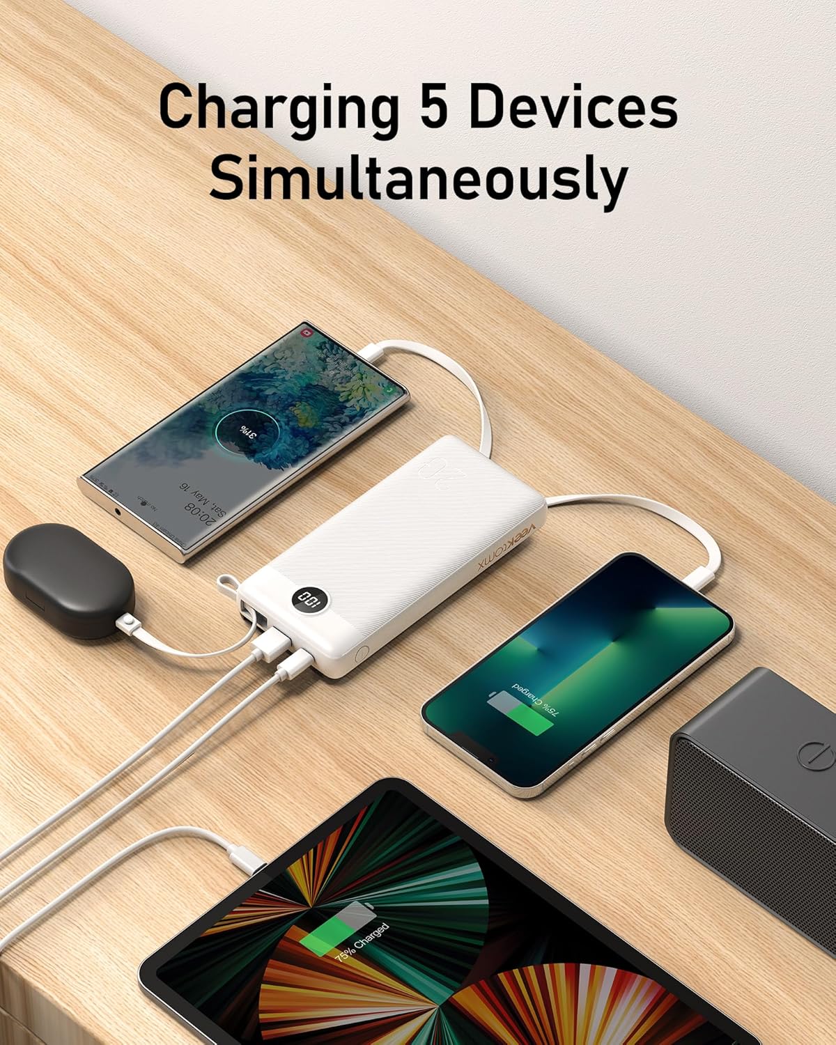 Multiple devices being charged simultaneously by the VEEKTOMX power bank