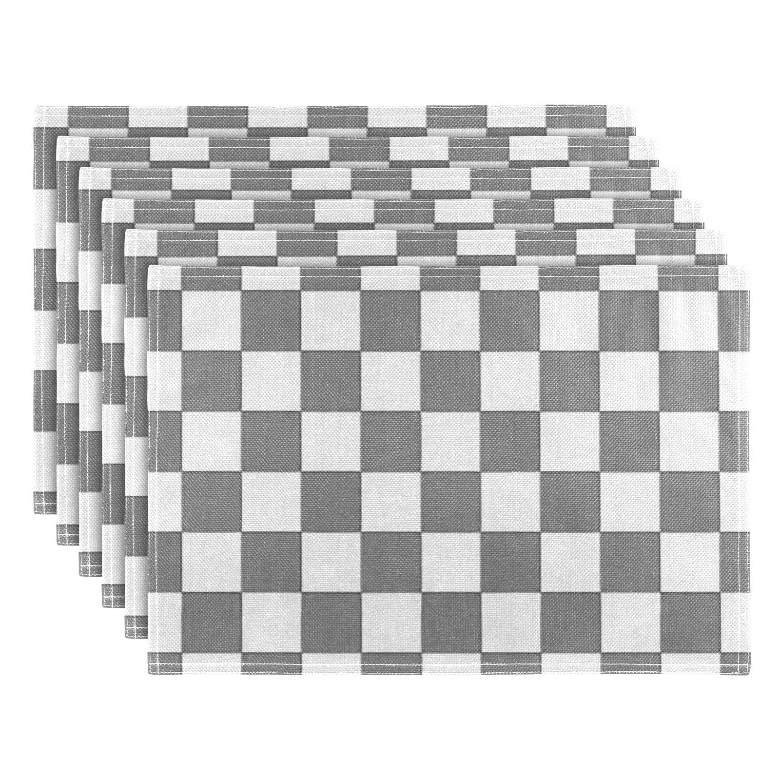 Sets de table gris à carreaux : finissez-en avec les taches sur votre nappe en tissu