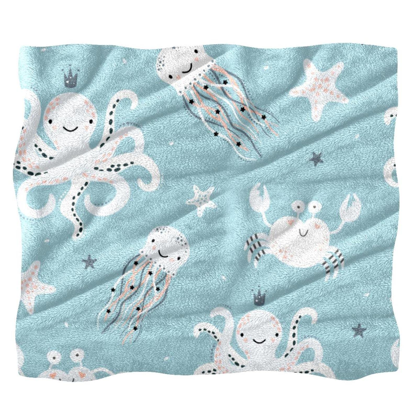 Couverture polaire méduse et pieuvre pour un canapé cocooning