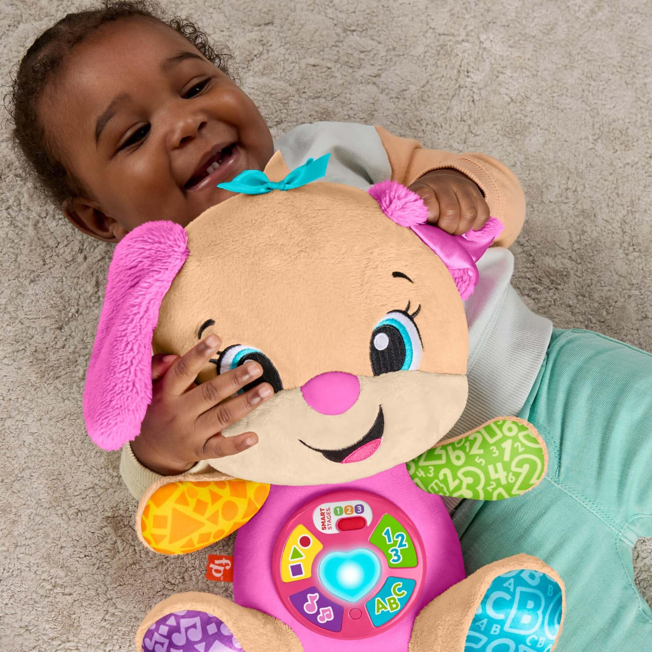 Fisher-Price Laugh & Learn Perrita con Smart Stages Peluche musical de aprendizaje con Smart Stages para bebés a partir de 6 meses, versión multilingüe: Italiano, Español, Portugués, Inglés, JFD35